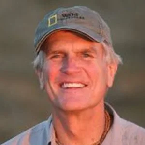 Image of Boyd Matson with a hat smiling