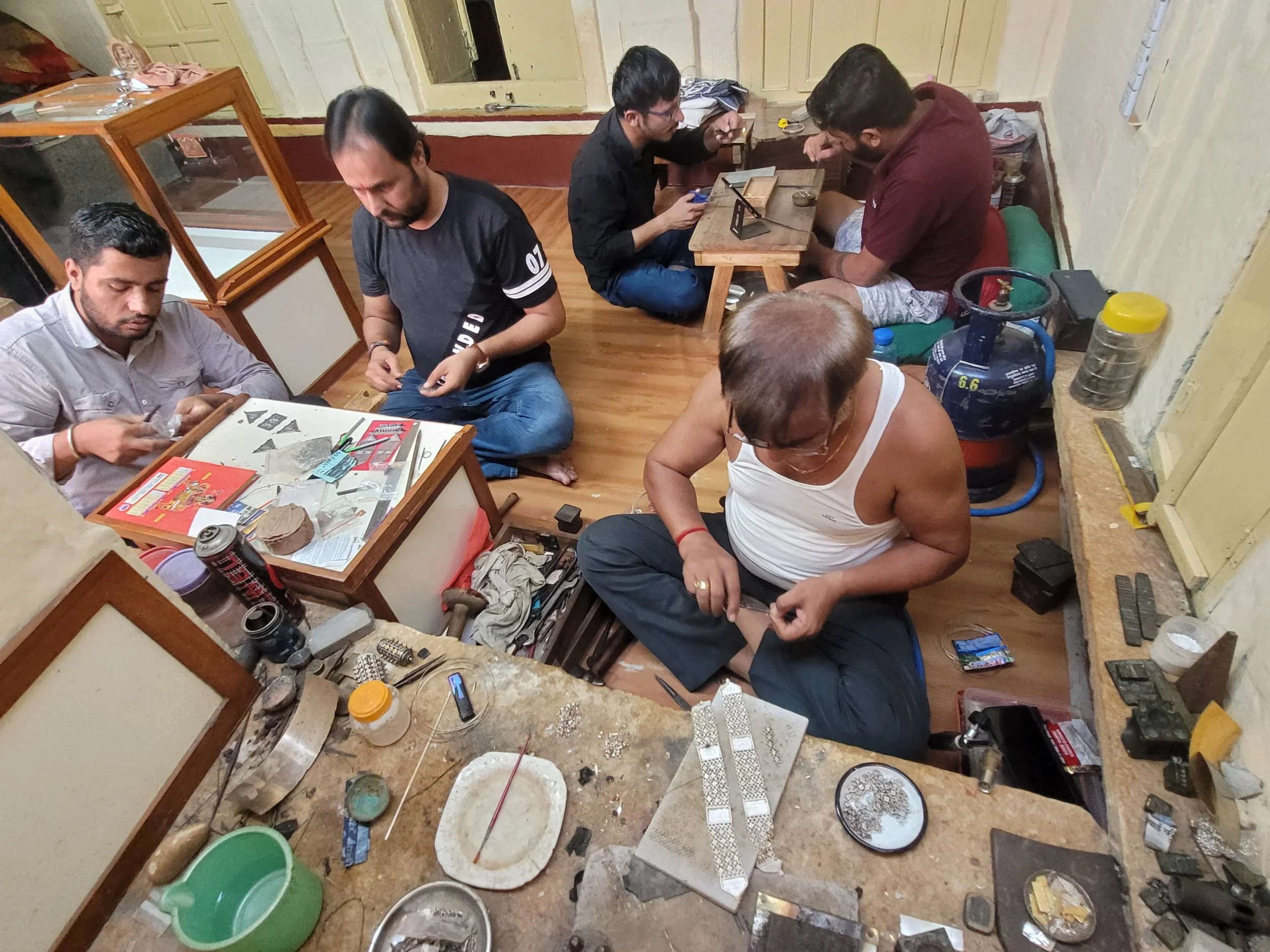 men working on jewelry