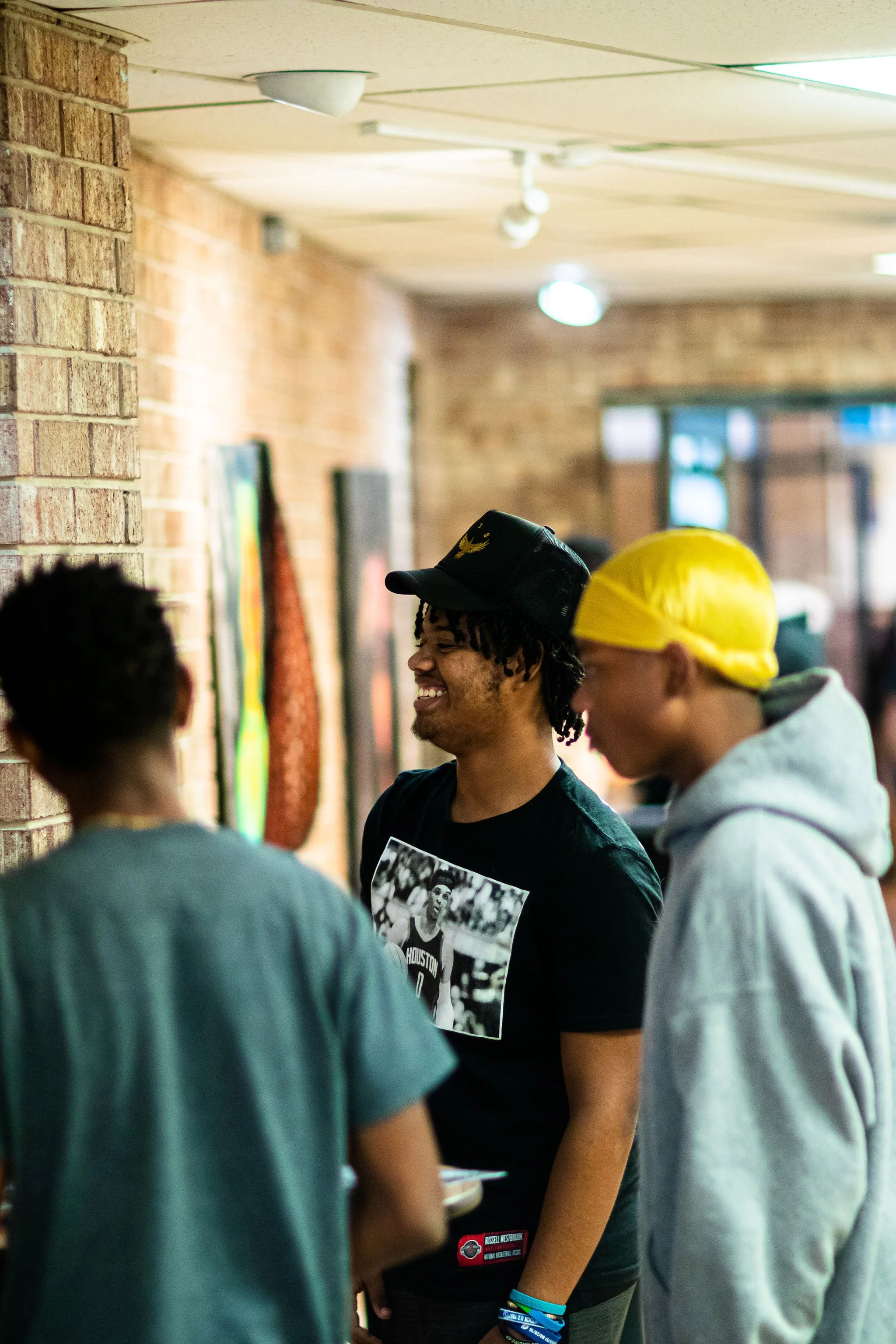 Young men enjoying the Exhibit.