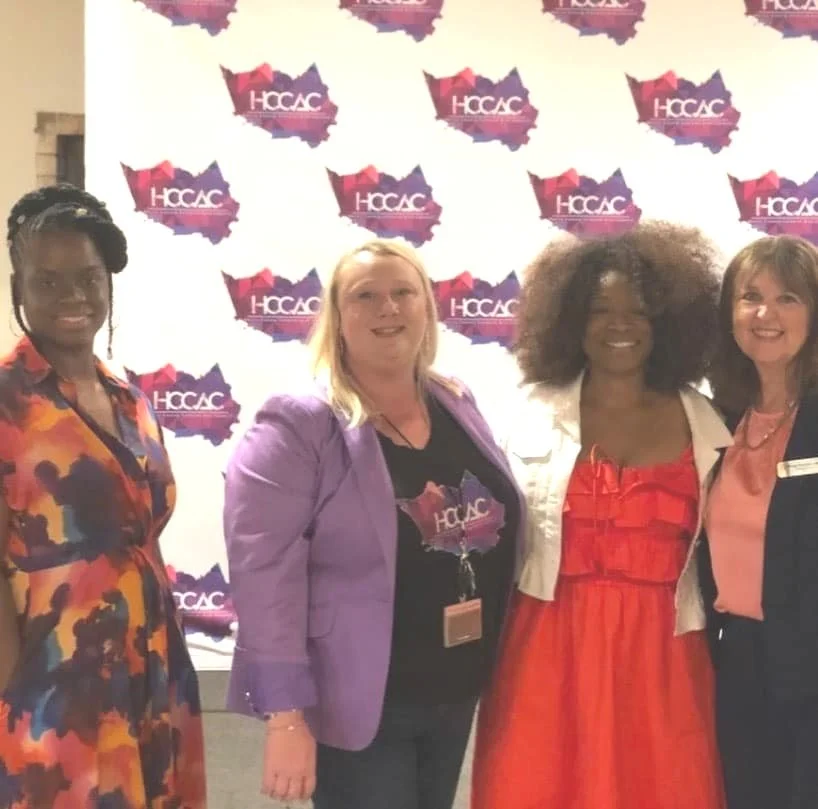 Michelle Bonton, Kristina Zatopek, and Stacy Allen taking a picture with one of the North Channel Chamber of Commerce council  