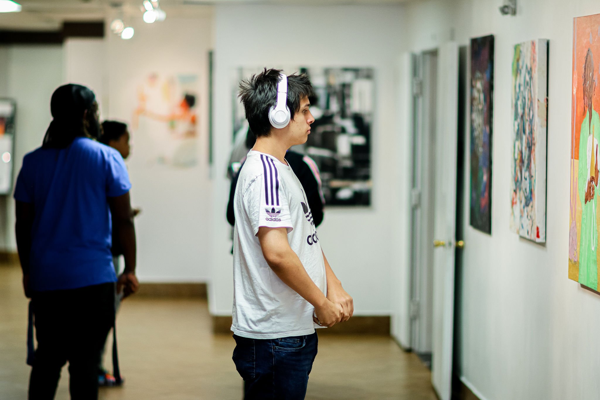Young boy admiring the artwork. 