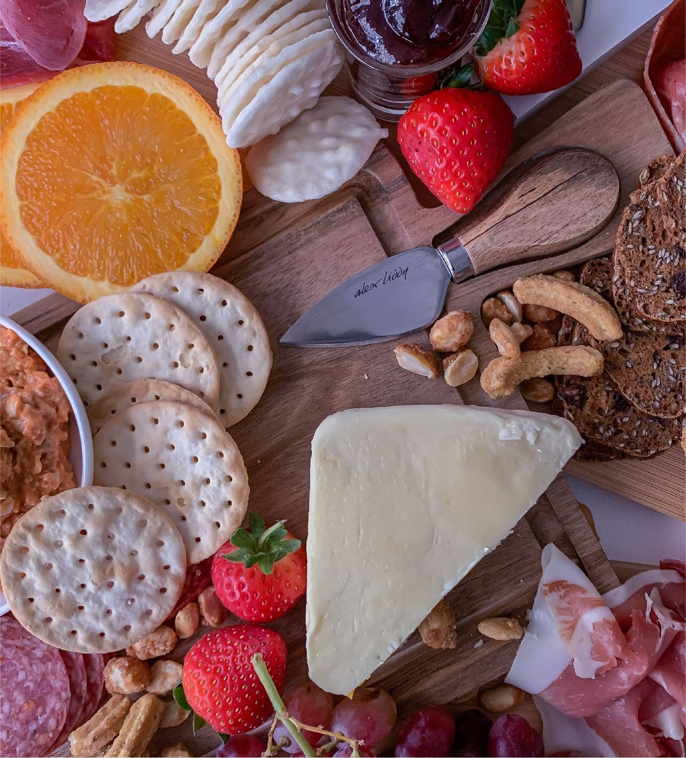 Acacia Cheese Board with Knife - Action.jpg