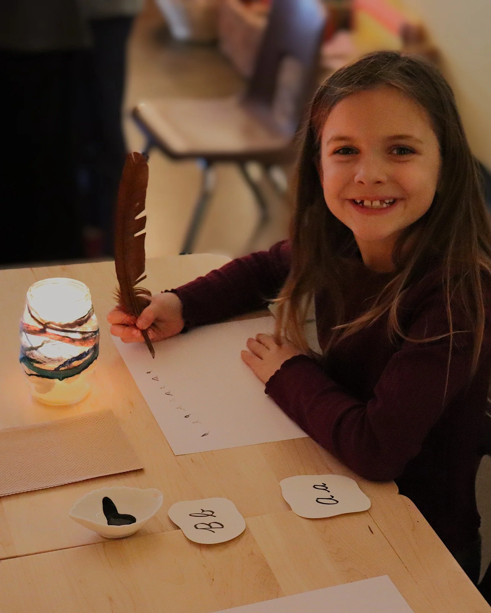 Introducing cursive by quill pen and lantern light created a magical bridge to the past for our Grade 3 class, transforming a foundational lesson into a sensory experience that deeply connected the students to the history of the written word.