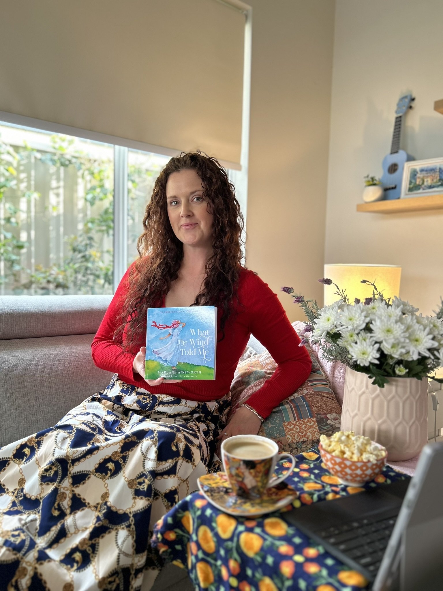 Merri with What The Wind Told Me Book.jpg