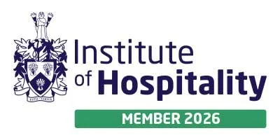 Logo for the Institute of Hospitality, indicating Member 2026, with a crest and stylized figures above.