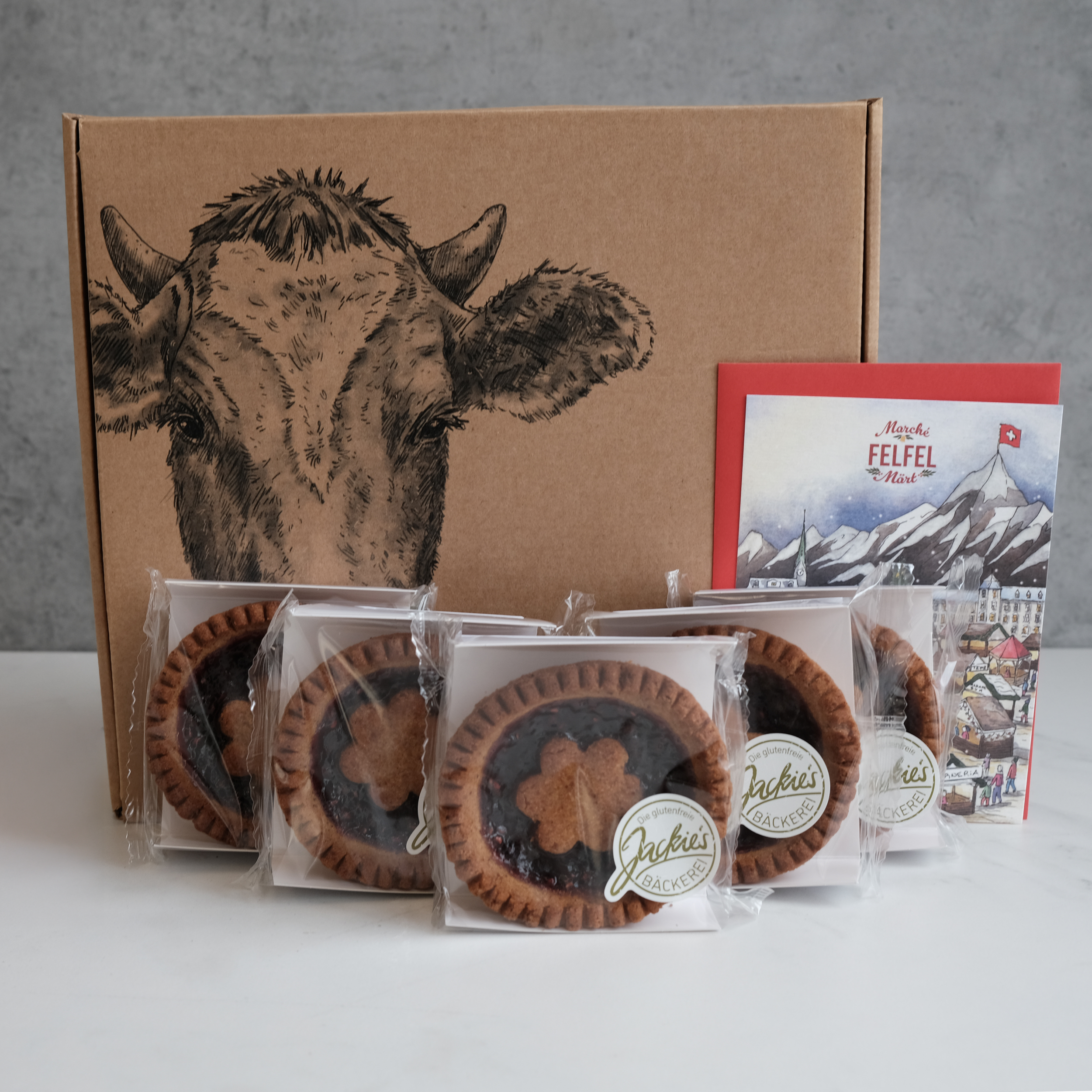 FELFEL Linzertörtli-Geschenkbox mit weihnachtlichem Gebäck.