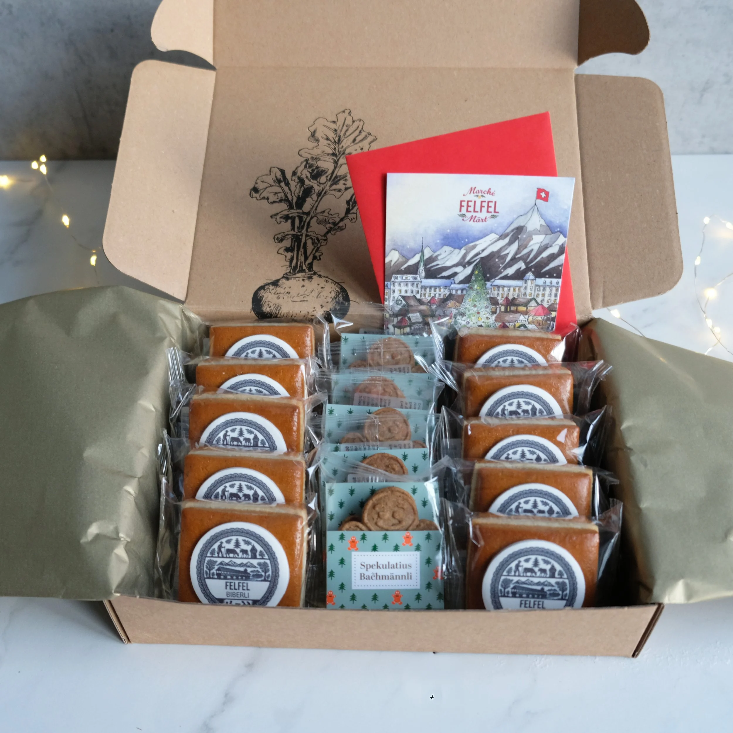 Geschenkbox mit Biberli und Spekulatius, inklusive dekorativer FELFEL Grusskarte.