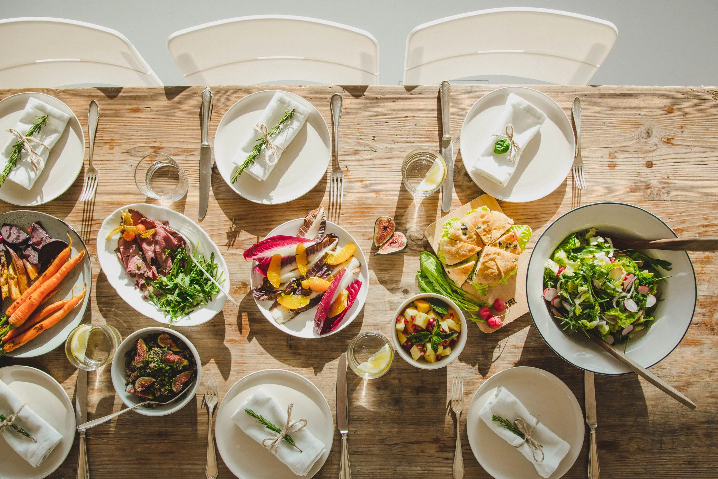 Students eat meals together from the FELFEL fridge in a university common room