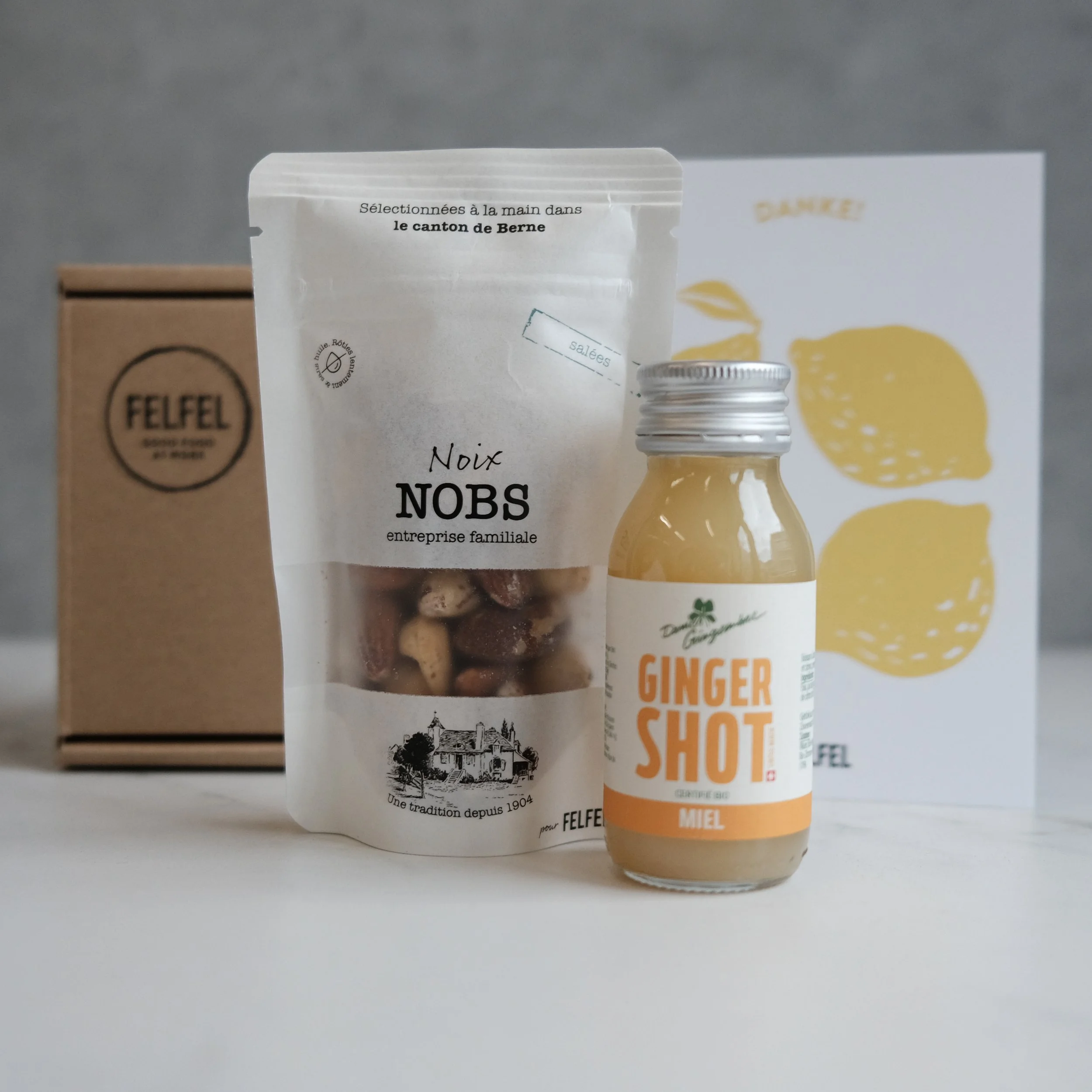 Box mit Nussmix und Boost-Snacks für mehr Energie im Büro.