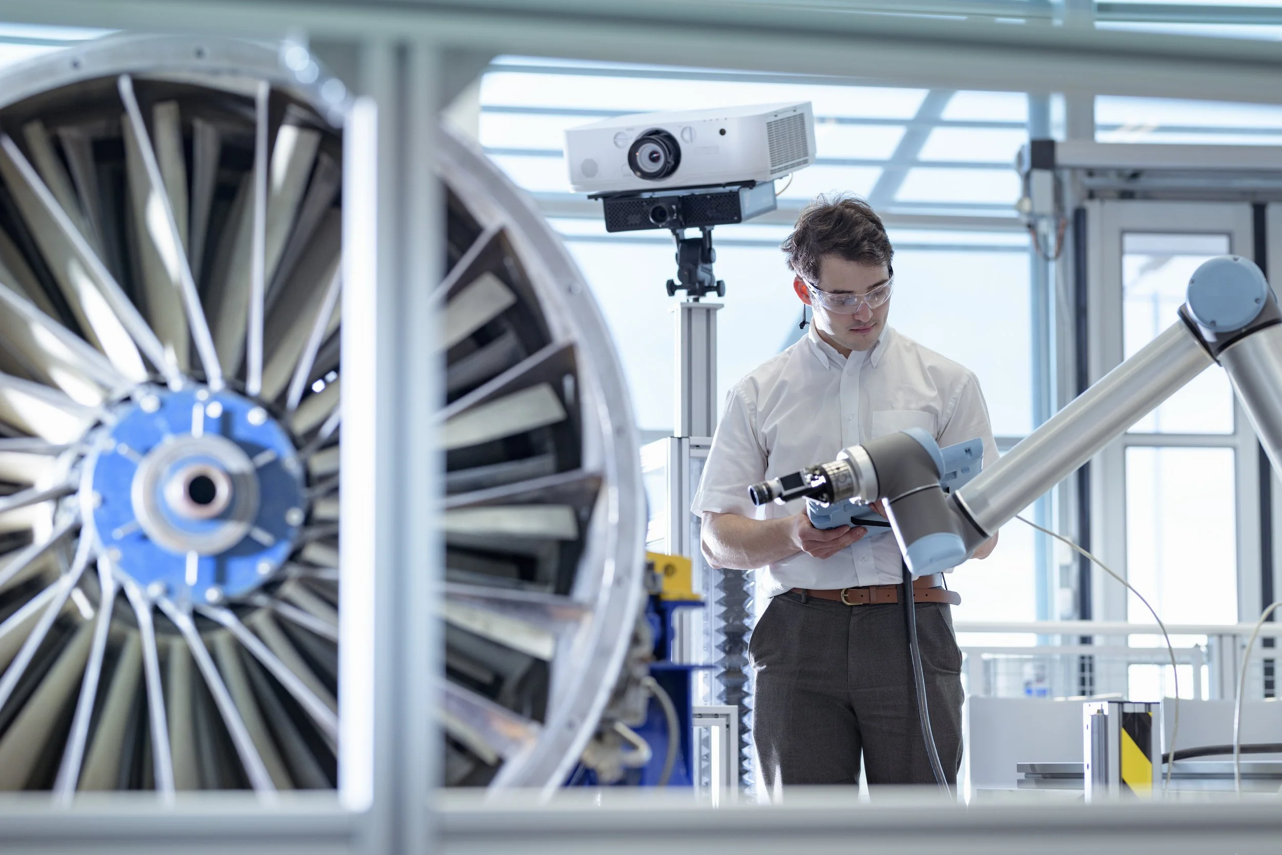 engineer-using-robotic-metrology-to-measure-jet-en-2022-03-04-01-43-06-utc.jpg