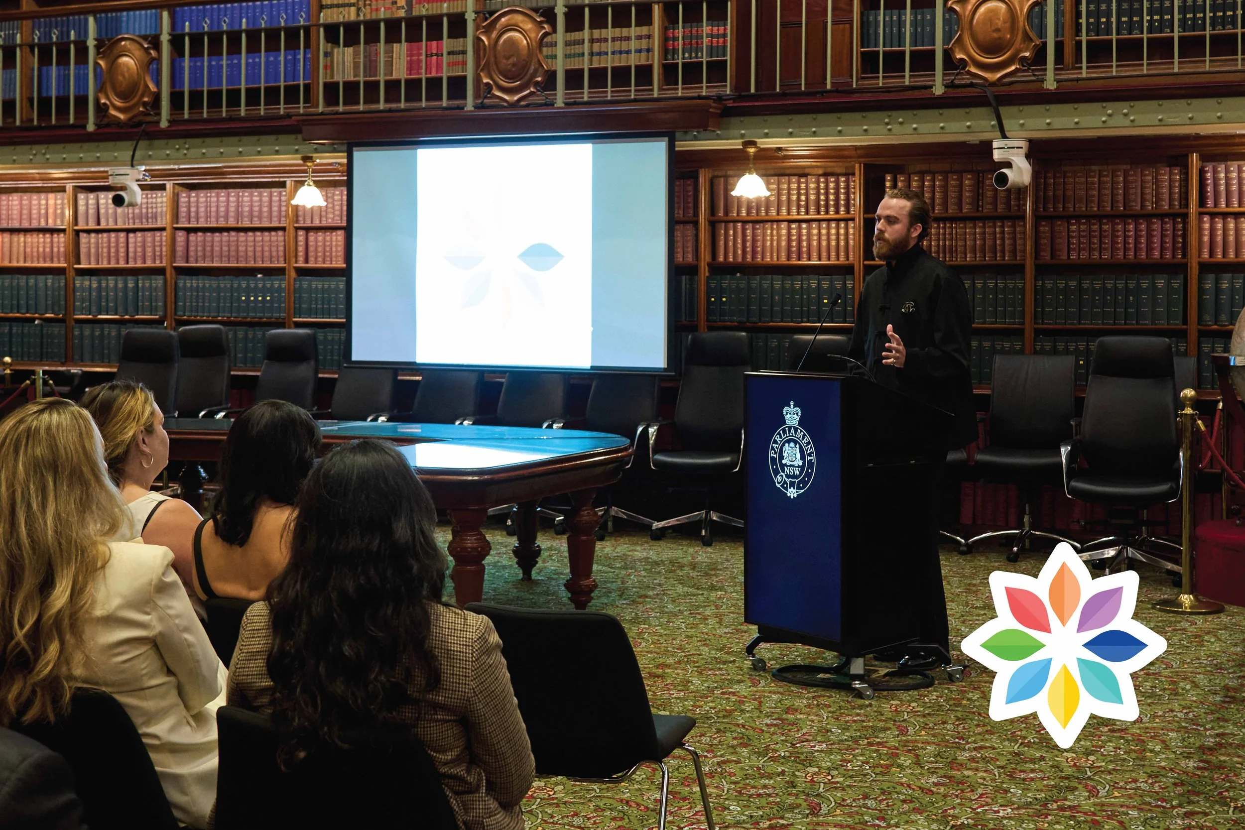 Ambassador Harrison James addresses the audience @ National Survivors Day event in New South Wales Parliament House 2025