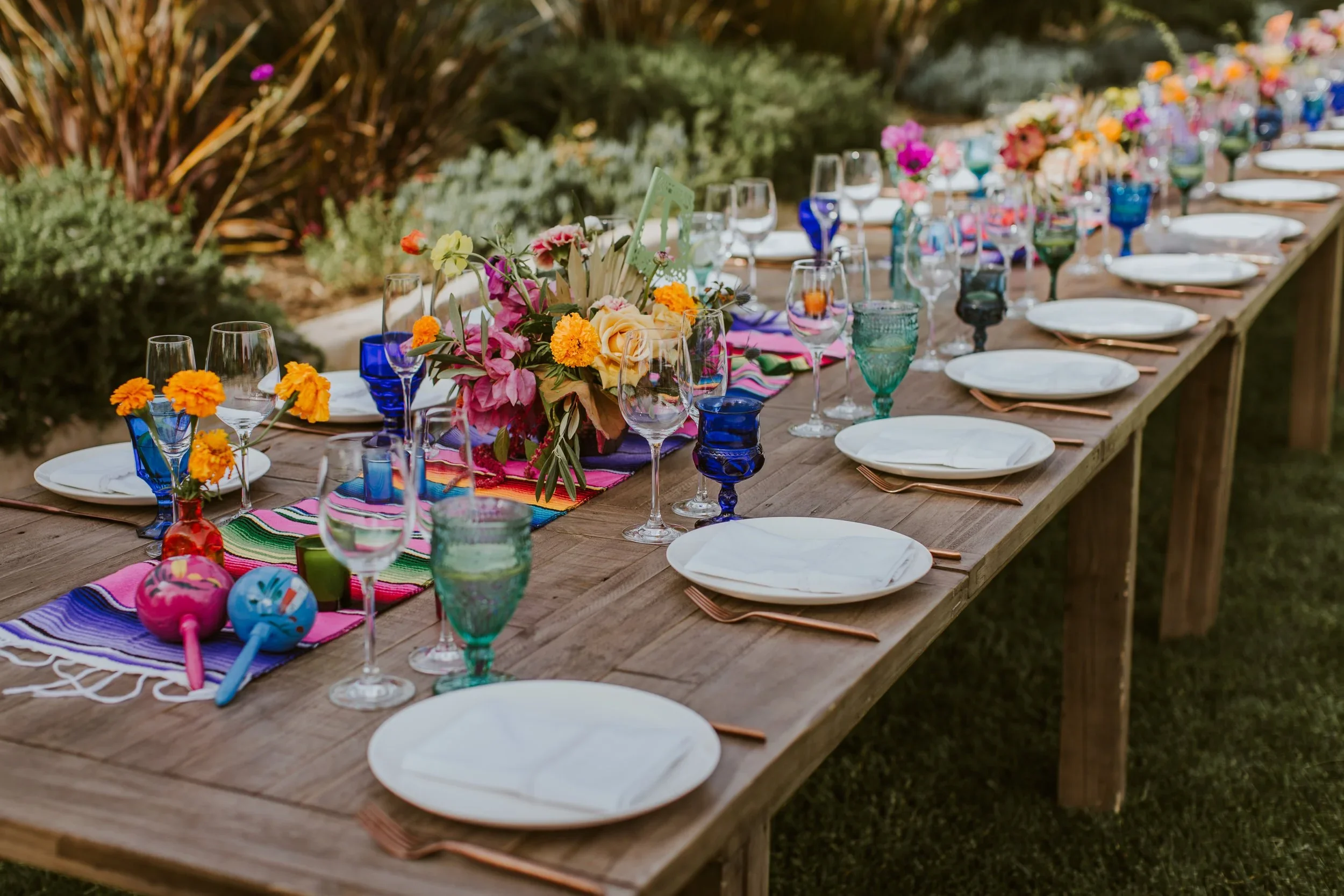 Colorful Spanish reception table with maracas