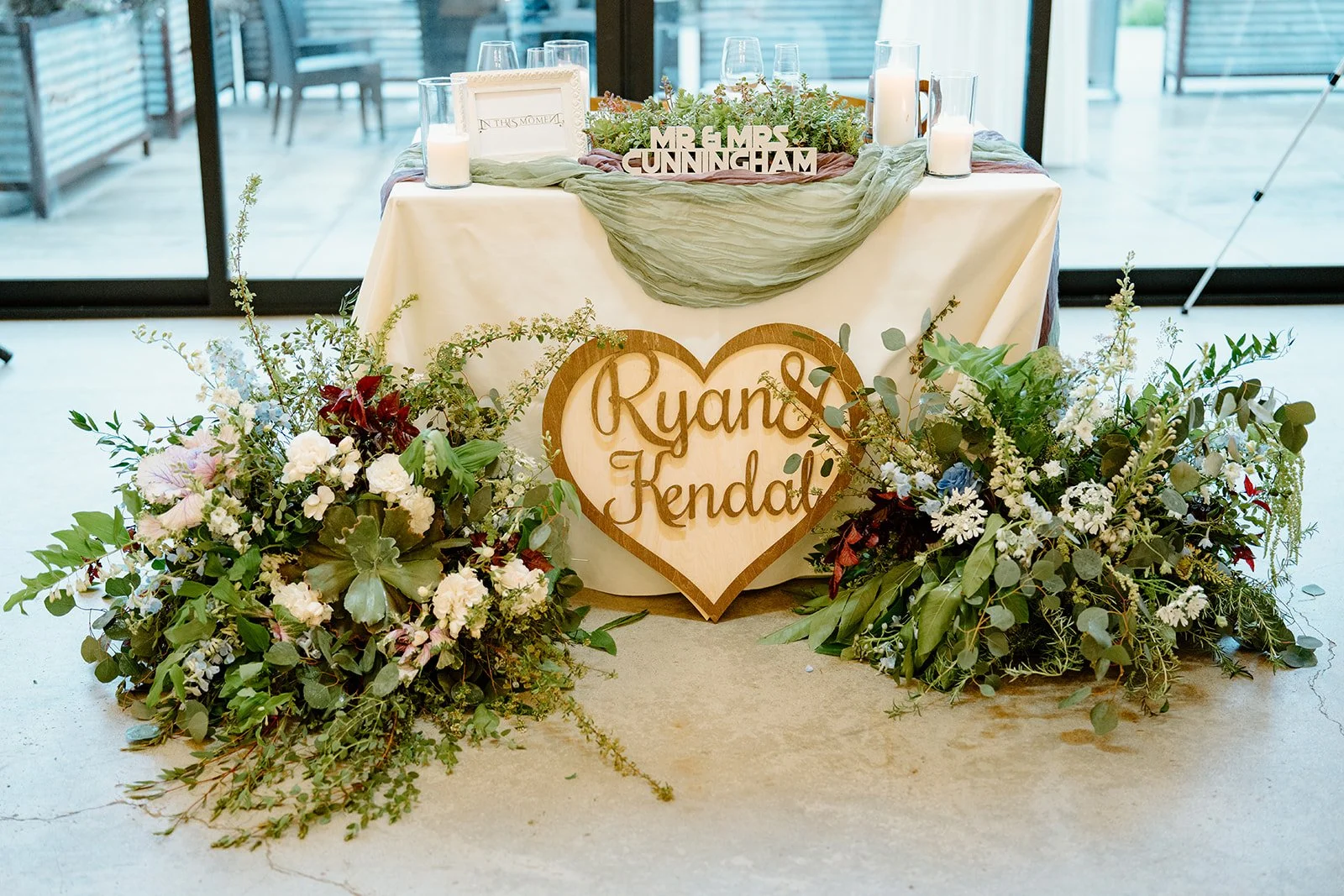 Couple's sweetheart table at winery reception