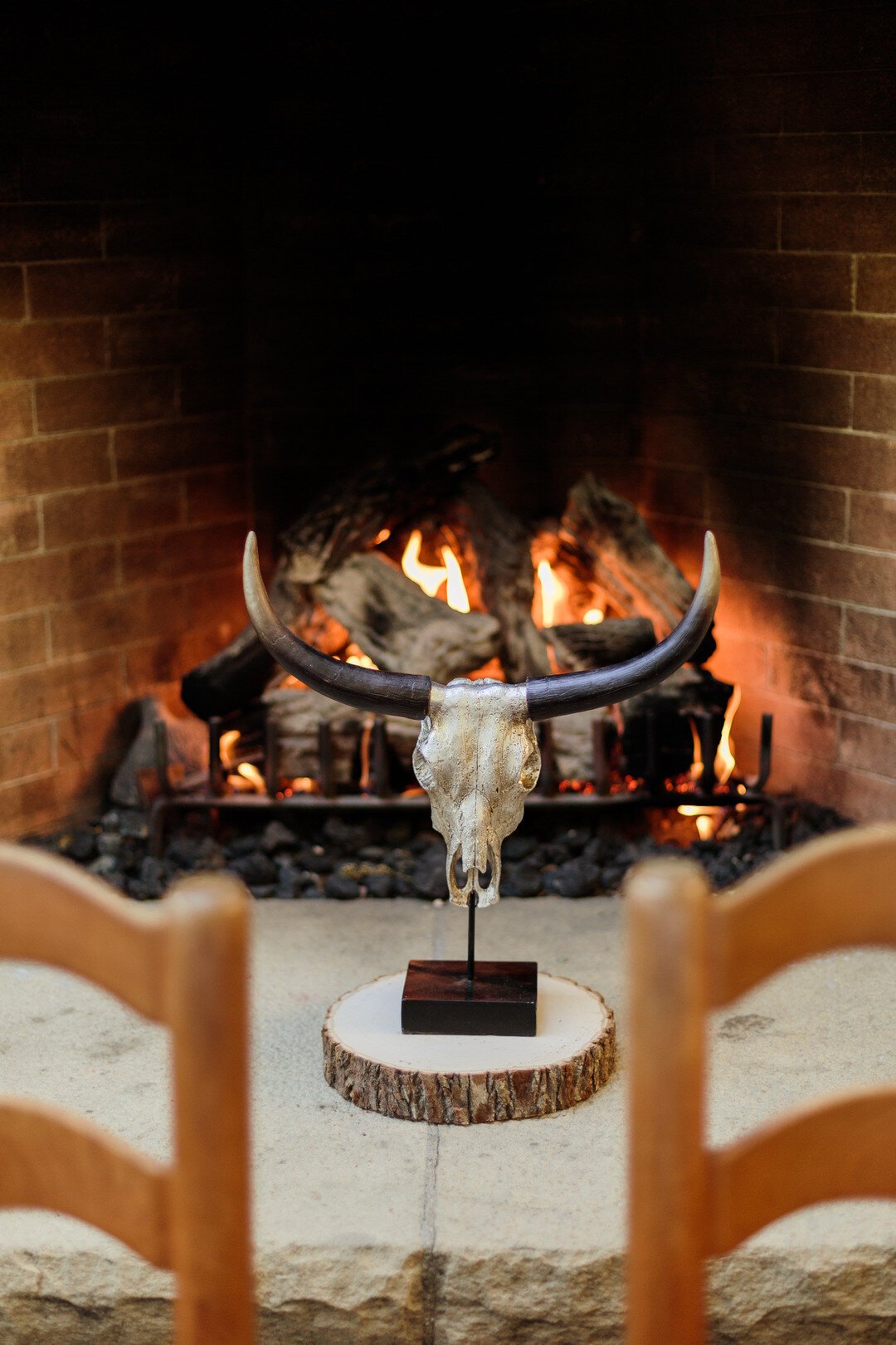 www.santabarbarawedding.com | Kaitie Brainerd | San Ysidro Ranch | Painted Antler Decoration in Front of the Fire