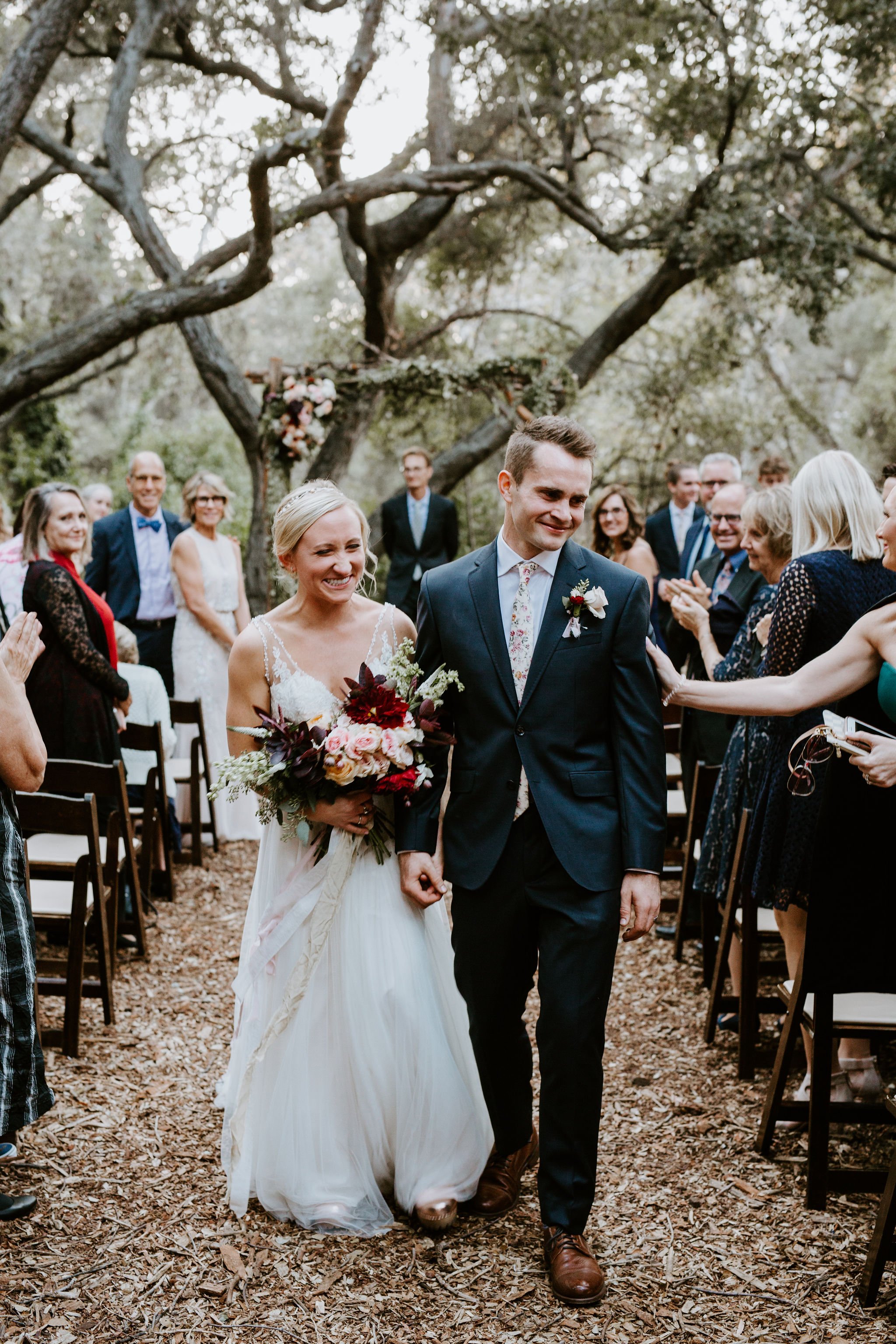 www.santabarbarawedding.com | Geoff and Lyndsi Photography | Santa Barbara Museum of Natural History | Jamie Mangone of LuJane Events | Topa Flora | Bride and Groom Leave Ceremony