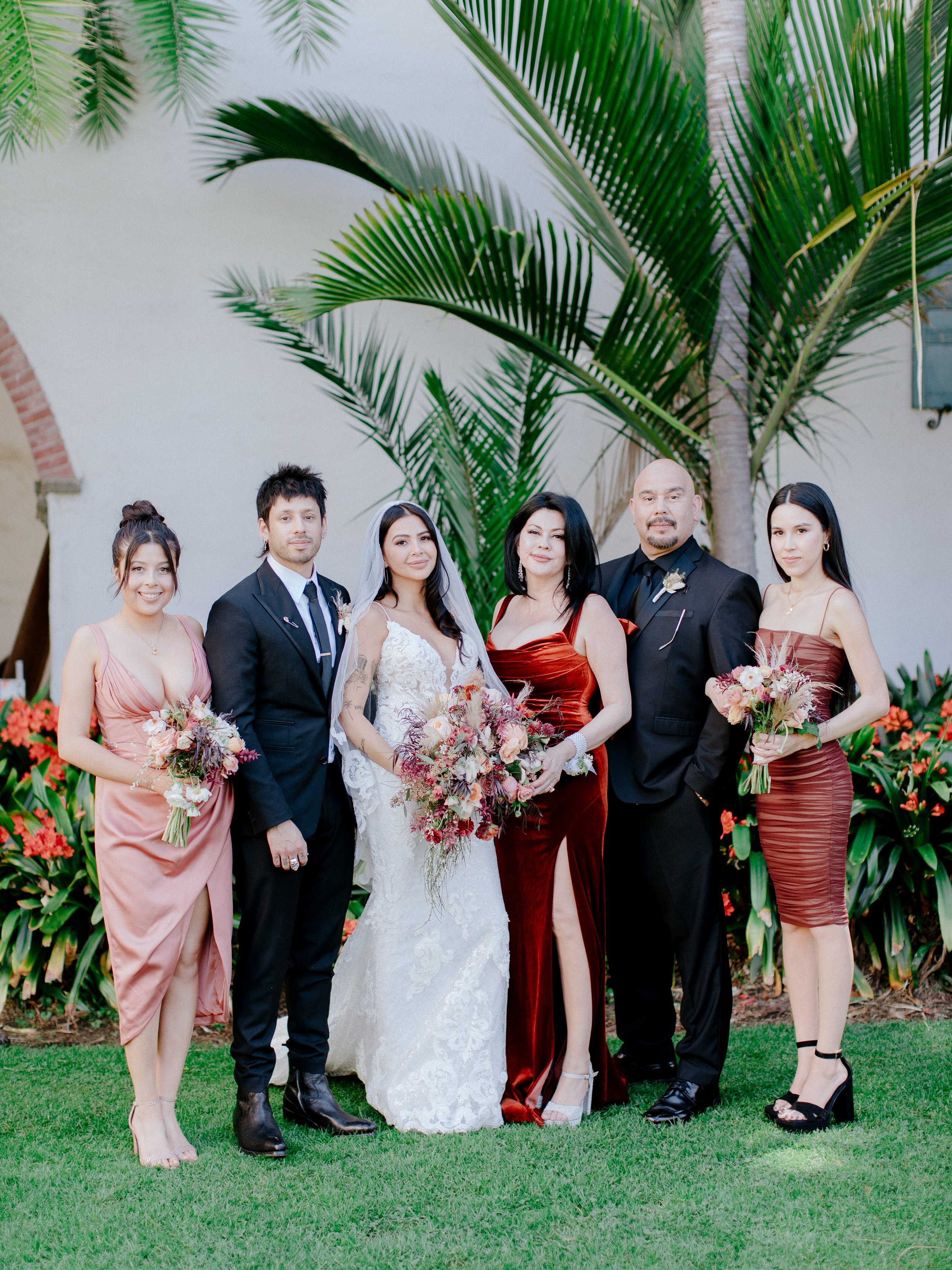 www.santabarbarawedding.com | Chris J. Evans | Santa Barbara Courthouse | David Alan | Anita’s Bridal | Couple Posing with Close Family and Friends