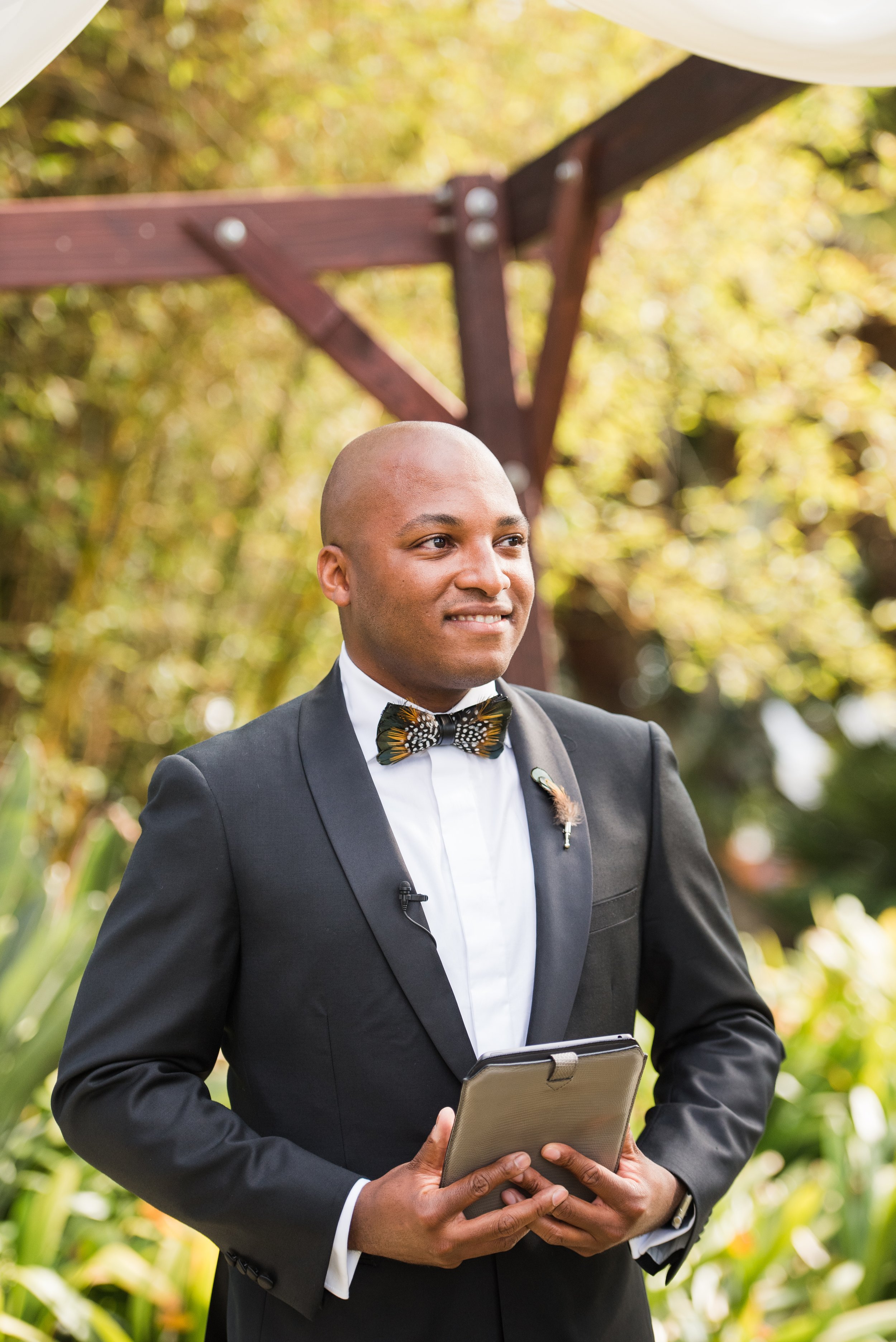 www.santabarbarawedding.com | ByCherry Photography | Santa Barbara Zoo | Events by Rincon | Jespersen Flowers | Officiant Waiting at the Ceremony 