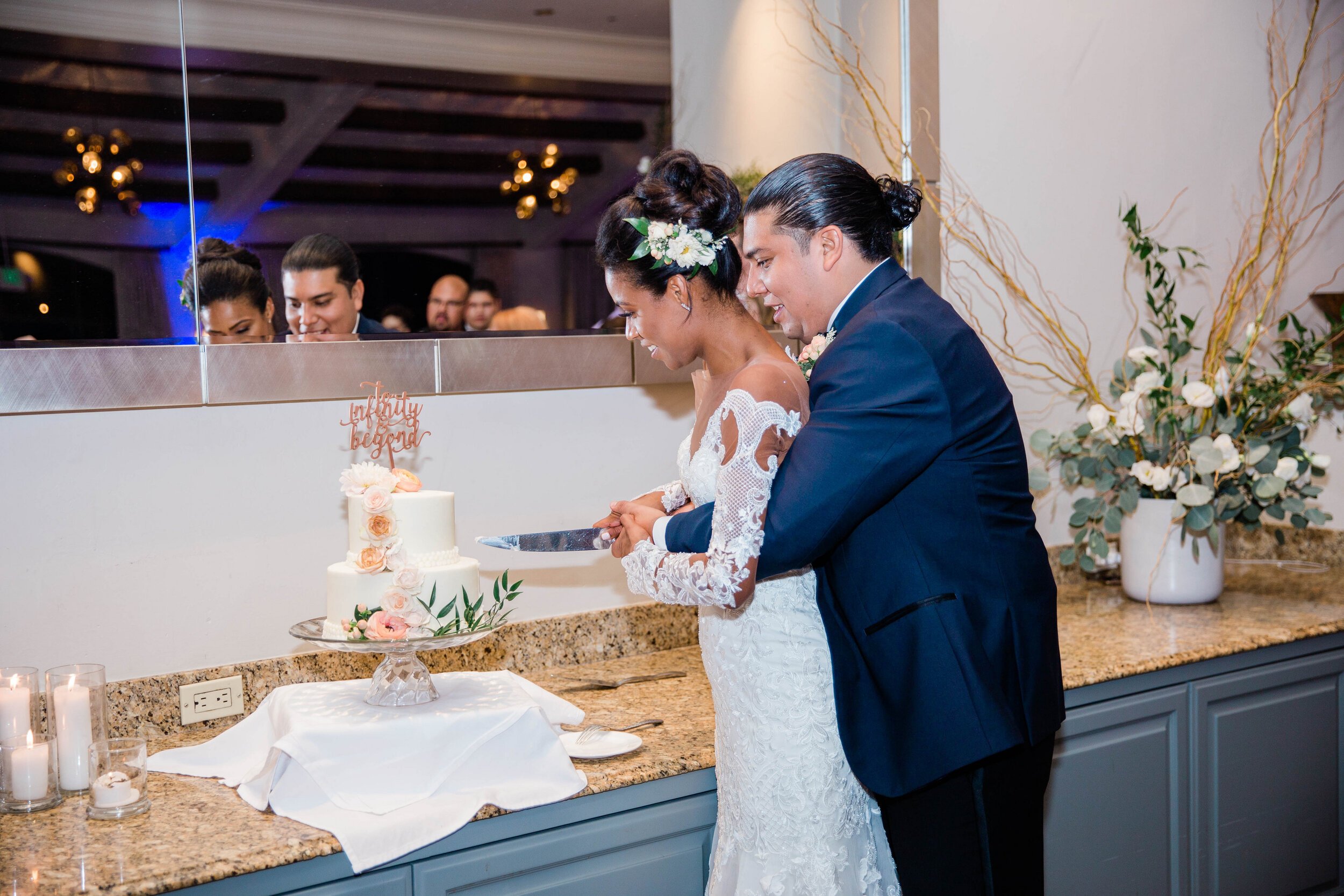 www.santabarbarawedding.com | White Sage Wedding &amp; Events | Amber Jean | Hilton SB Beachfront Resort | Ojai Blooms | Enjoy Cupcakes | Anomalie | Bride and Groom Cut the Cake