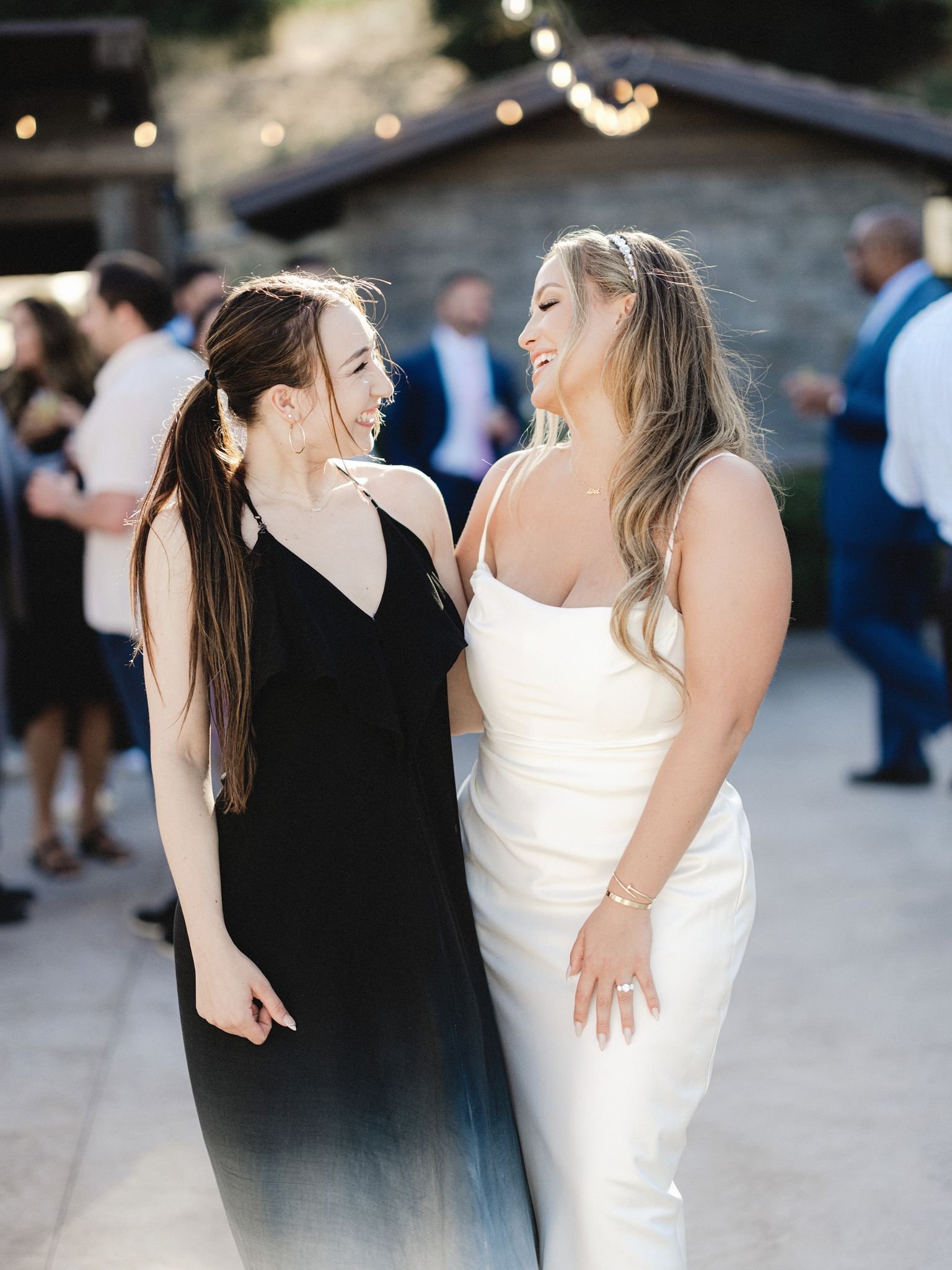 www.santabarbarawedding.com | Zaca Creek | Paul Von Rieter | Lisa Lafferty Events | Glenna Joy Flowers | Theoni Collection | Bride Posing with A Friend