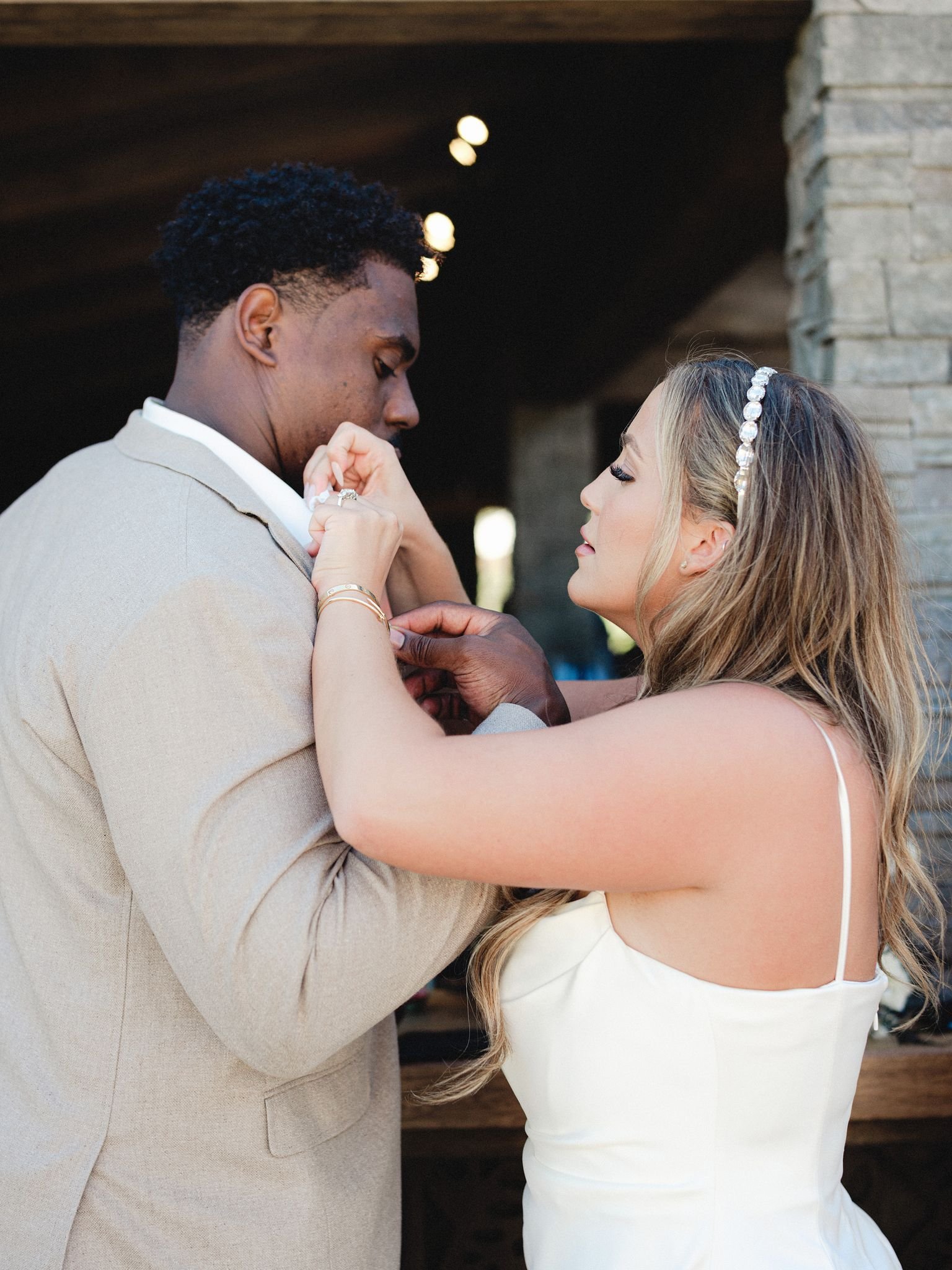 www.santabarbarawedding.com | Zaca Creek | Paul Von Rieter | Lisa Lafferty Events | Glenna Joy Flowers | Theoni Collection | Bride Fixing Her Groom’s Shirt