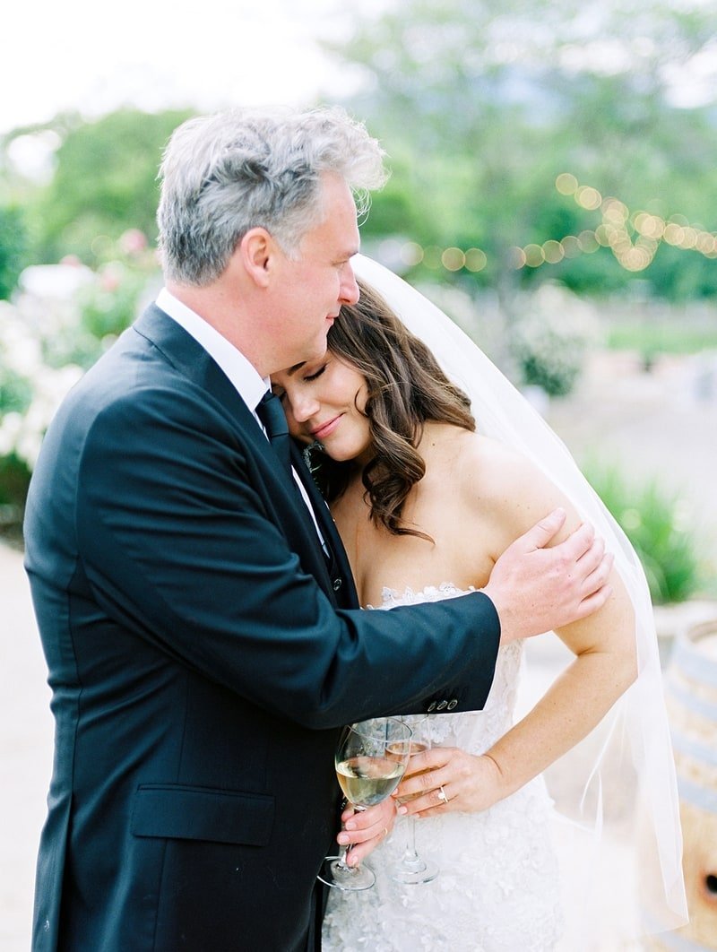 www.santabarbarawedding.com | White Sage | Taryn Grey Photography | Ojala Floral | The Tent Merchant | Otis &amp; Pearl | TEAM Hair &amp; Makeup | Couple Embracing at Reception 