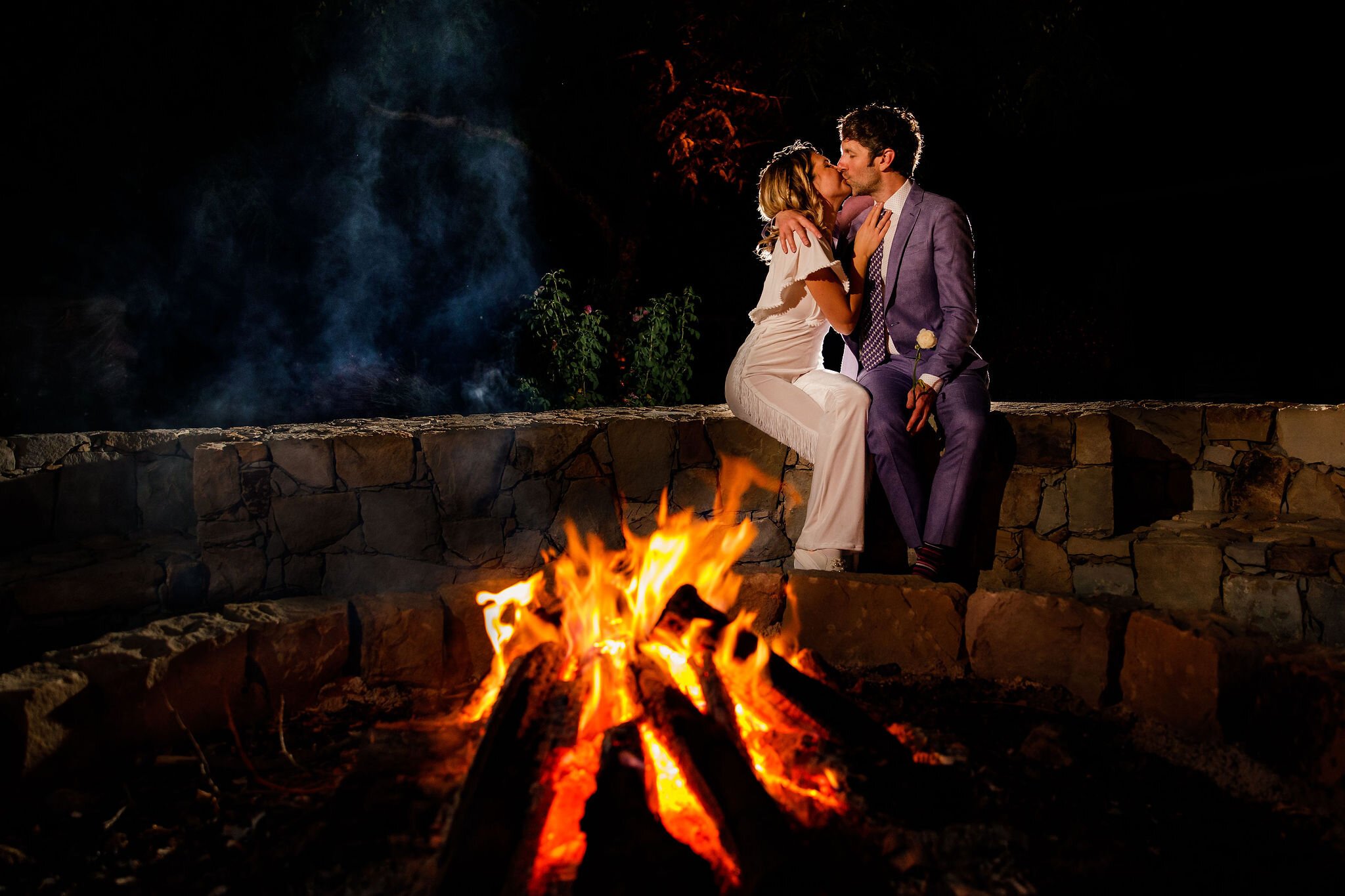 www.santabarbarawedding.com | White Sage Wedding &amp; Events | Burgundy Blue | Marlies Hart | Frog Creek Lavender Farm | In the Mix Events | Bride and Groom Kiss by the Campfire 