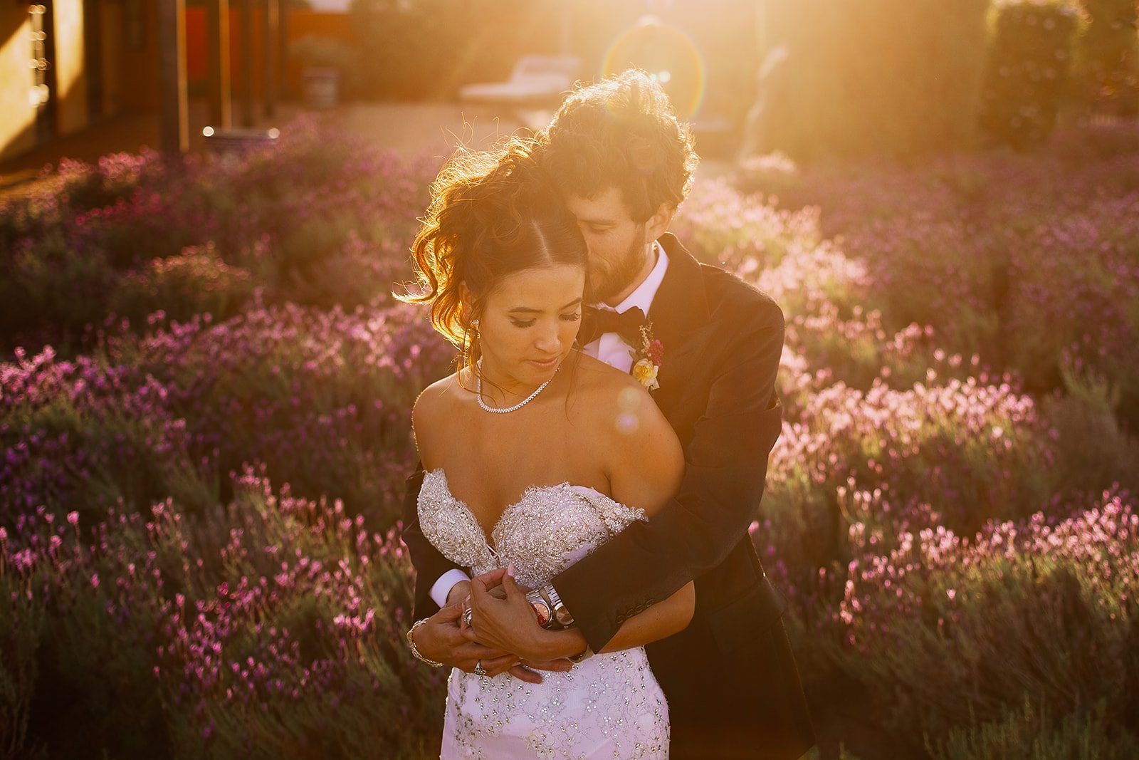 www.santabarbarawedding.com | David Mendoza | Alexis Ireland Florals | TEAM Hair &amp; Makeup | Couple Embracing Outside