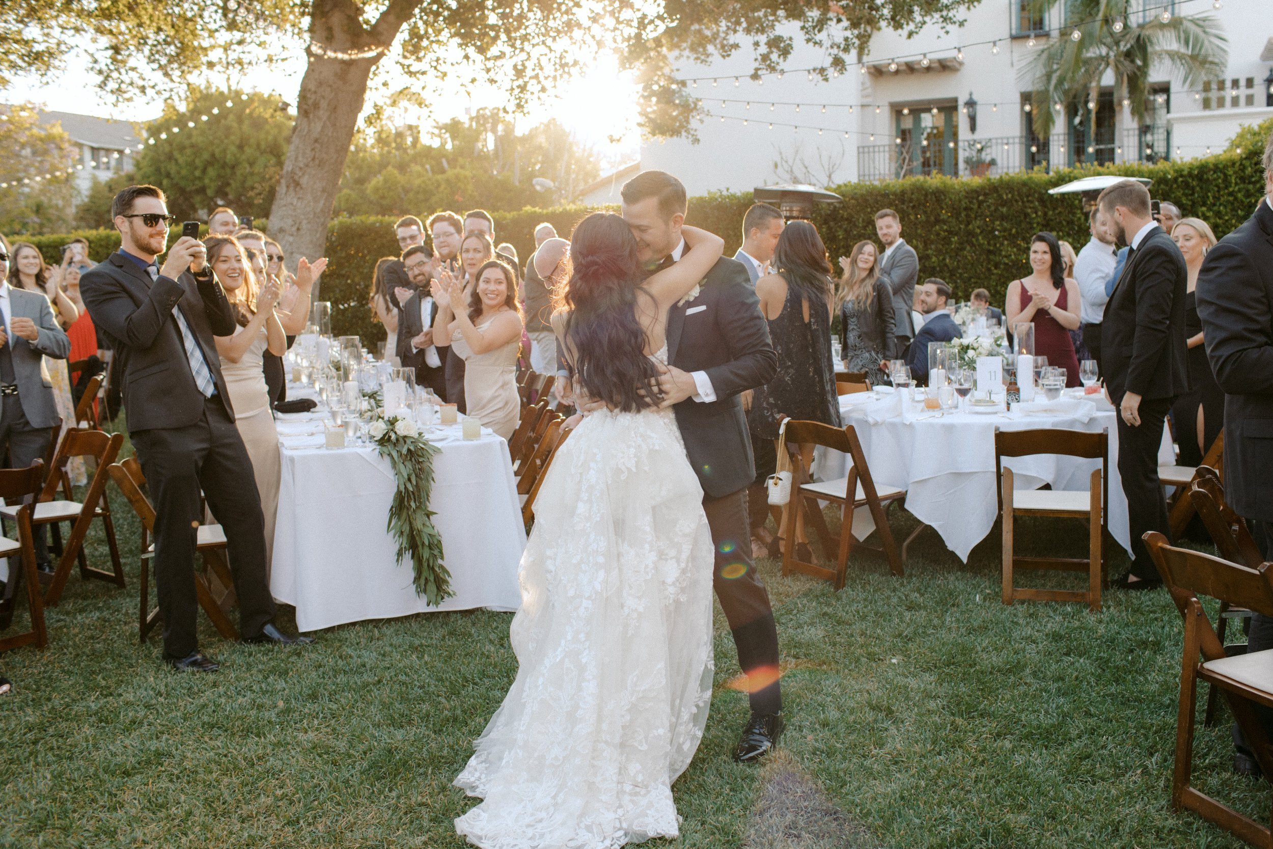 www.santabarbarawedding.com | KB Events | Ali Beck | The Santa Barbara Club | Poppy Pod Floral Design | Just 4 Fun Party Rentals | The Black Tux | Maggie Sottero | Couple Entering Reception