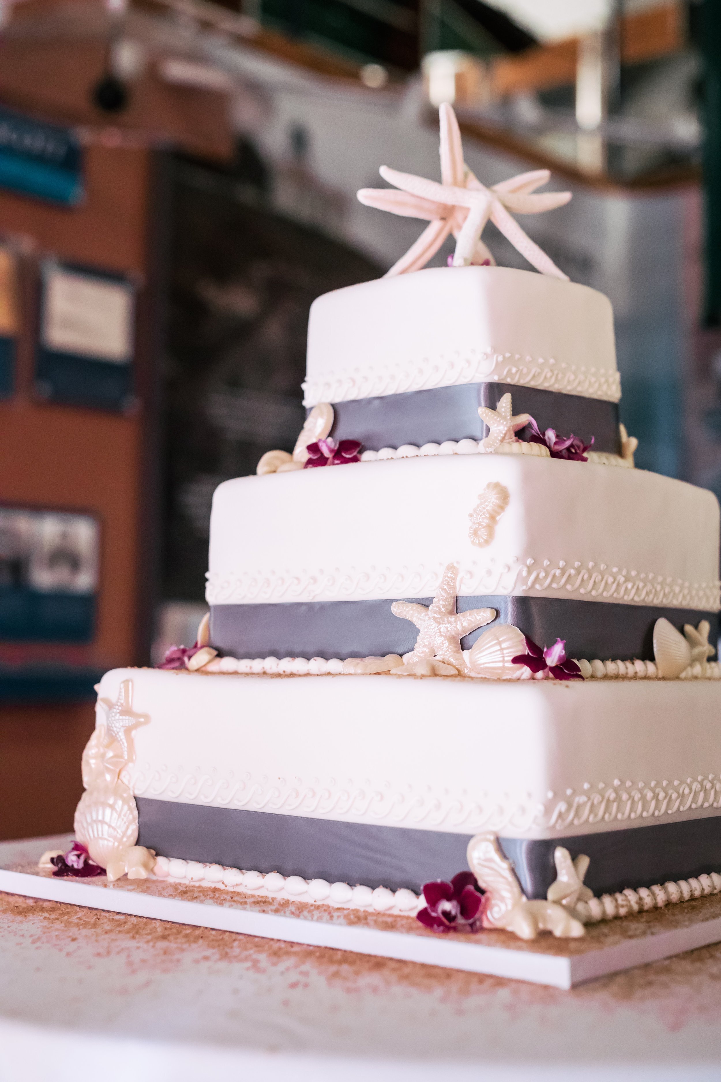 www.santabarbarawedding.com | Rewind Photography | Wedding Cake with Seashells