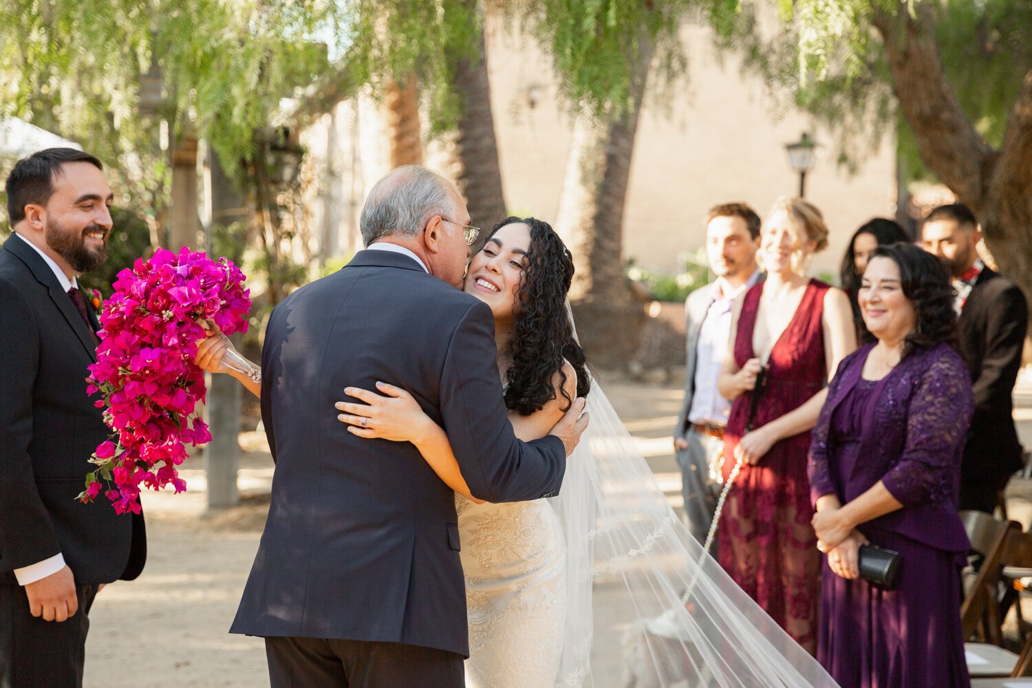 www.santabarbarawedding.com | SB Historical Museum | Veils &amp; Tails Photography | SB Wedding Coordinator | Grass Roots | LunaBella Makeup &amp; Hair | Bride Hugging Father Before Ceremony