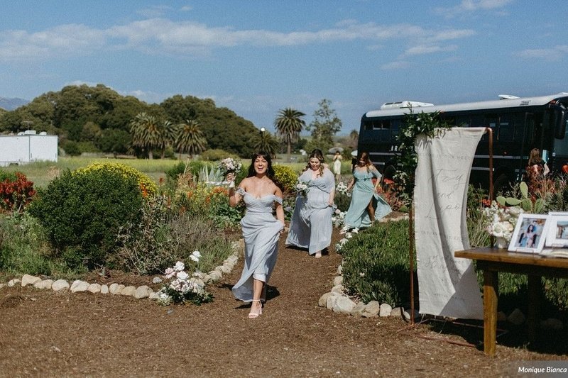 www.santabarbarawedding.com | Dos Pueblos Orchid Farm | Monique Bianca | White Sage | Intrepid Floral Co. | Jump on the School Bus | Bridesmaids Arriving at Reception 