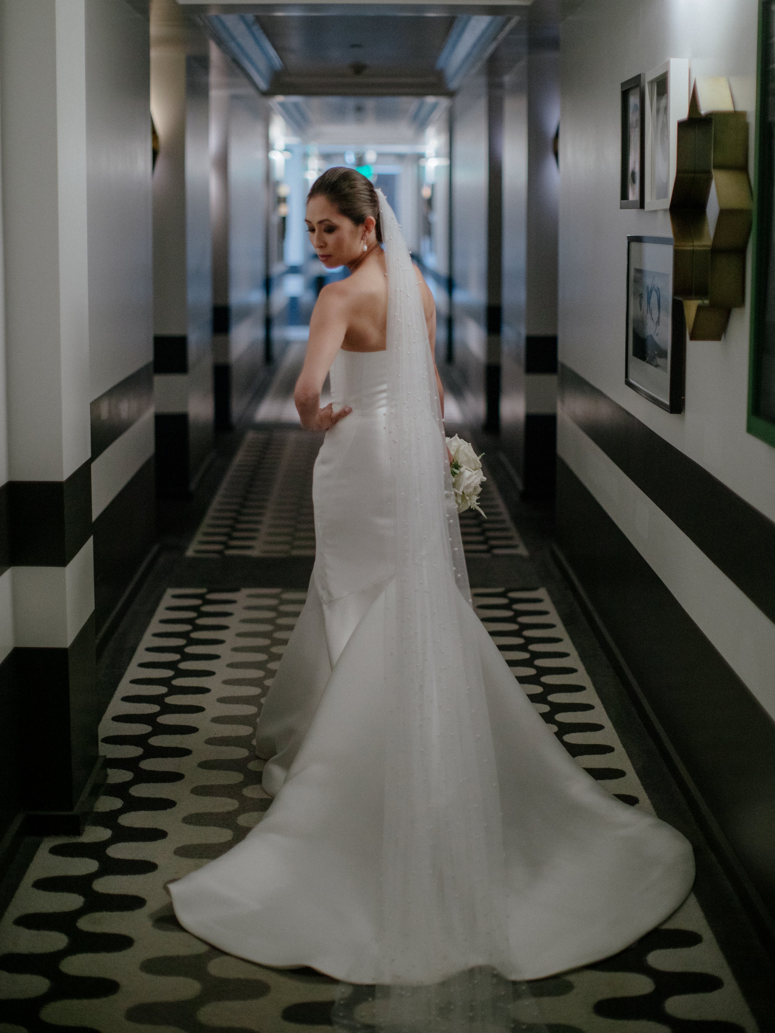 www.santabarbarawedding.com | Chris J. Evans | Hotel Californian | Tyler Speier Events | TEAM Hair &amp; Makeup | Pronovias | Bride Showing Off the Back of Her Wedding Gown