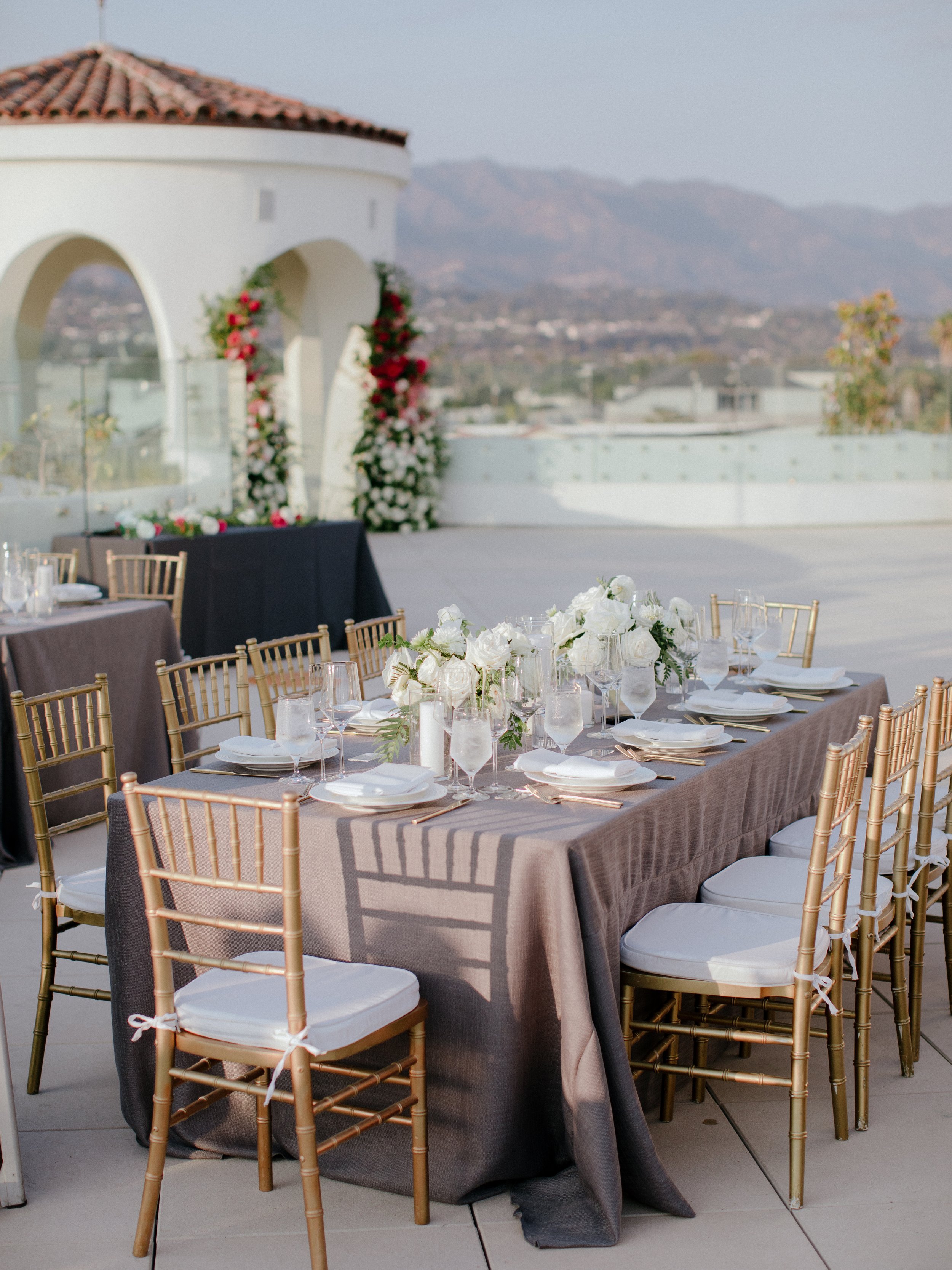www.santabarbarawedding.com | Chris J. Evans | MOXI Museum | Tyler Speier Events | The Tent Merchant | Bella Vista Designs | Omni Catering | Reception Table Set Up on Rooftop