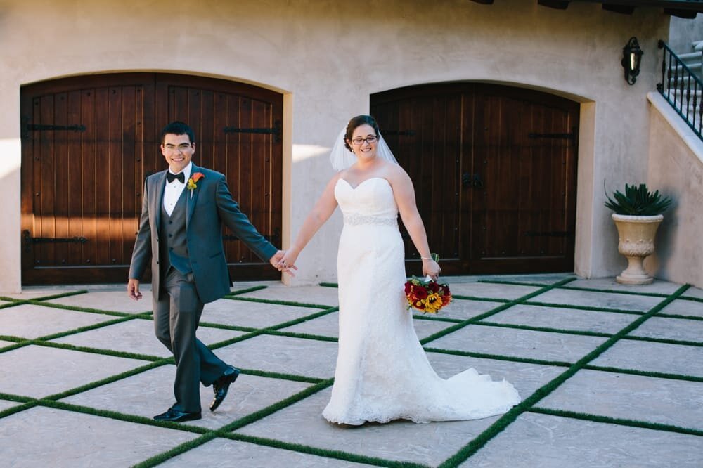 www.santabarbarawedding.com | Ana Maria’s Bridal Boutique | Simone Anne Photography | Bride and Groom Hand in Hand