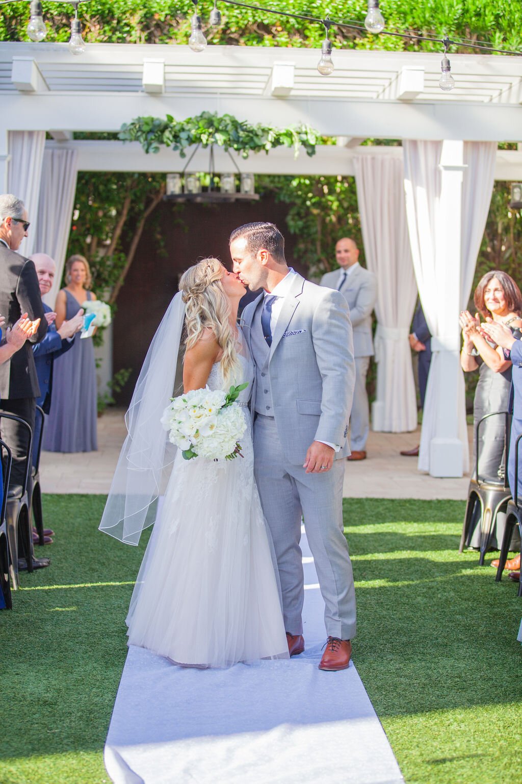 www.santabarbarawedding.com | Fess Parker Wine Country Inn | Epiphany Events | Linda Chaja | Wild Poppy Floral Design | LunaBella | Bride and Groom’s First Kiss