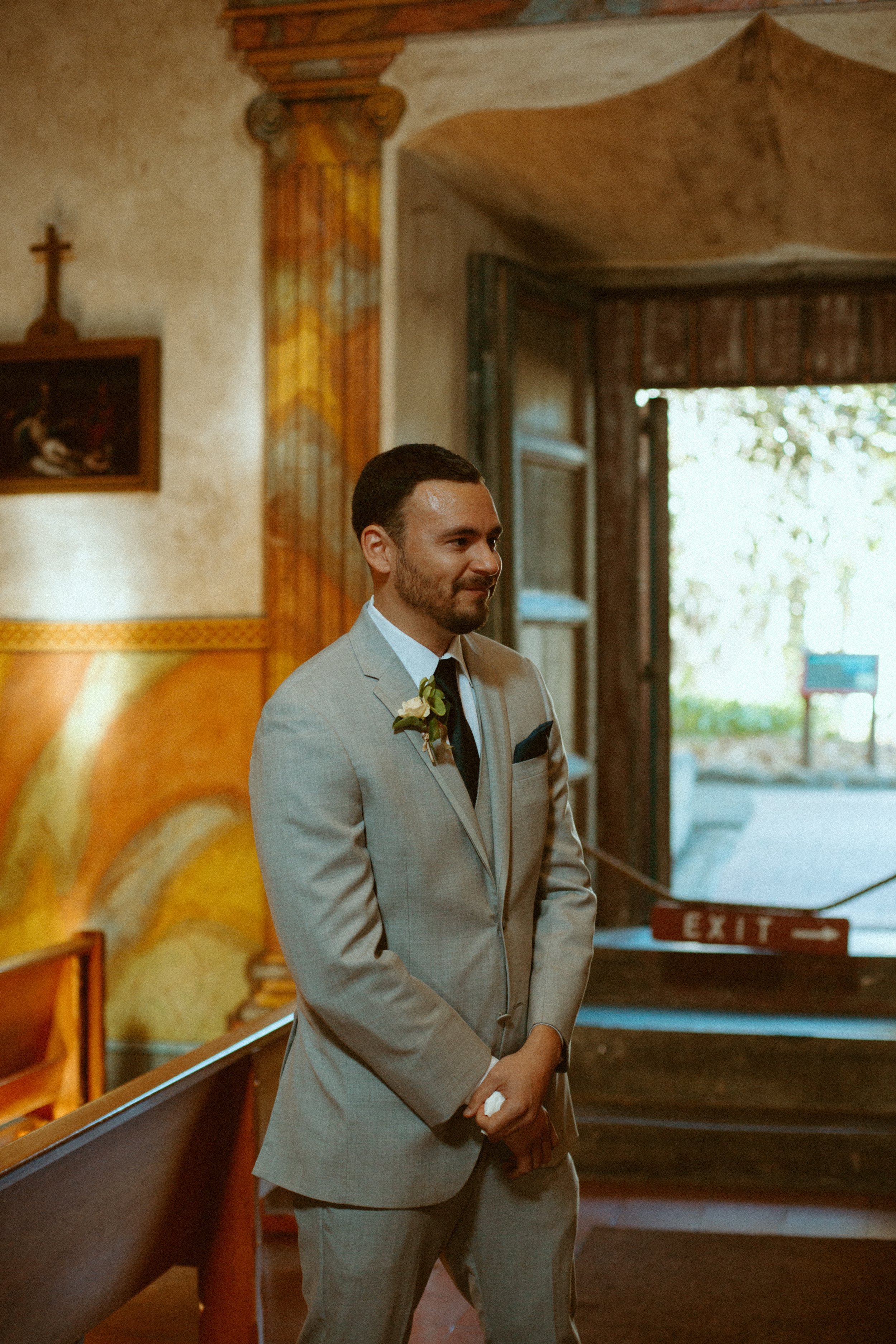 www.santabarbarawedding.com | Mallory Carlson | Old Mission SB | Events by Tiffany J | Antheia Floral &amp; Design | Men’s Wearhouse | Groom Waiting For His Bride at the Church