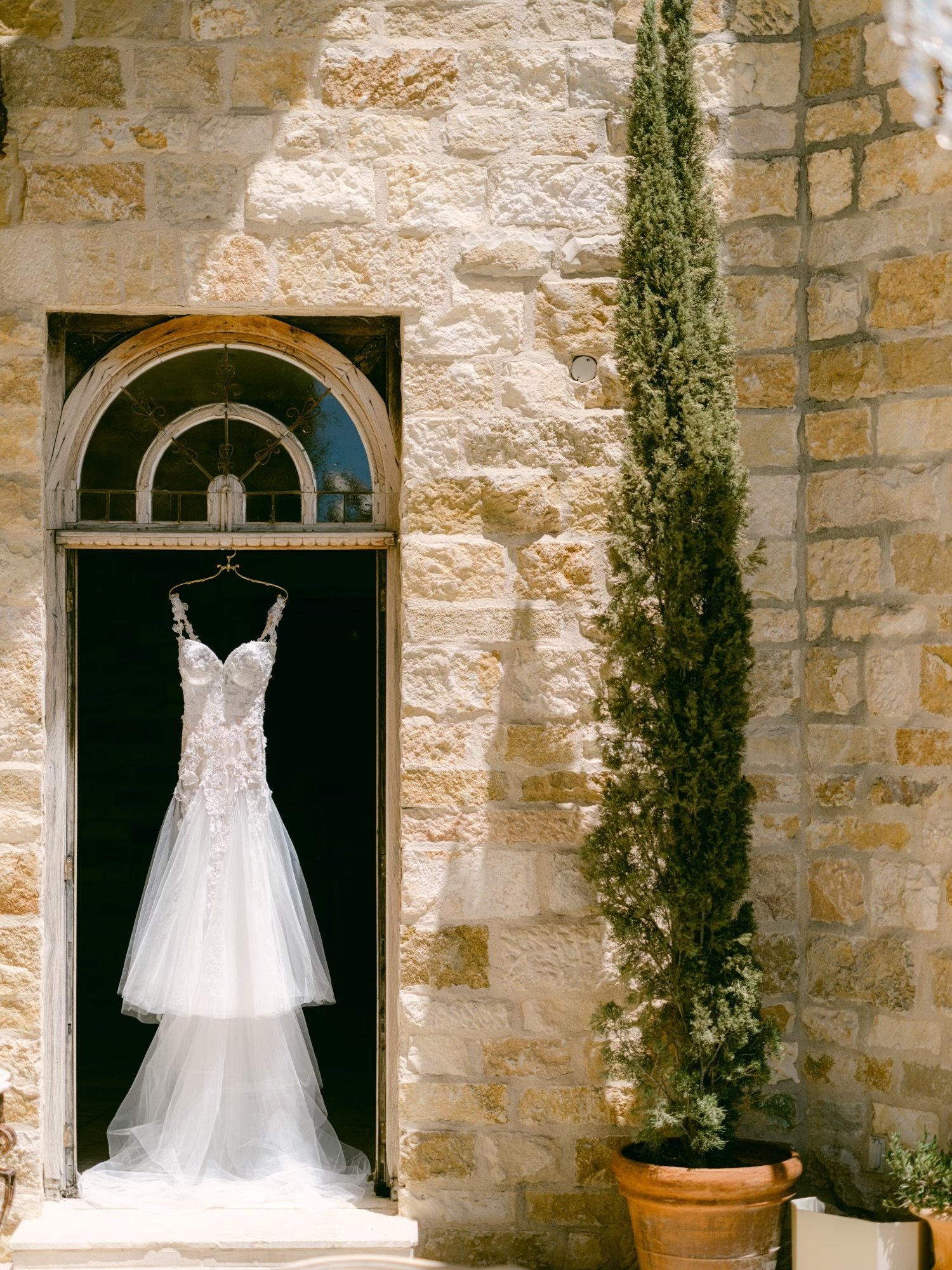www.santabarbarawedding.com | Paul Von Rieter | Sunstone Villa | Lisa Lafferty | Shawna Yamamoto | Galia Lahav | Bride’s Wedding Gown Hanging from Door Frame