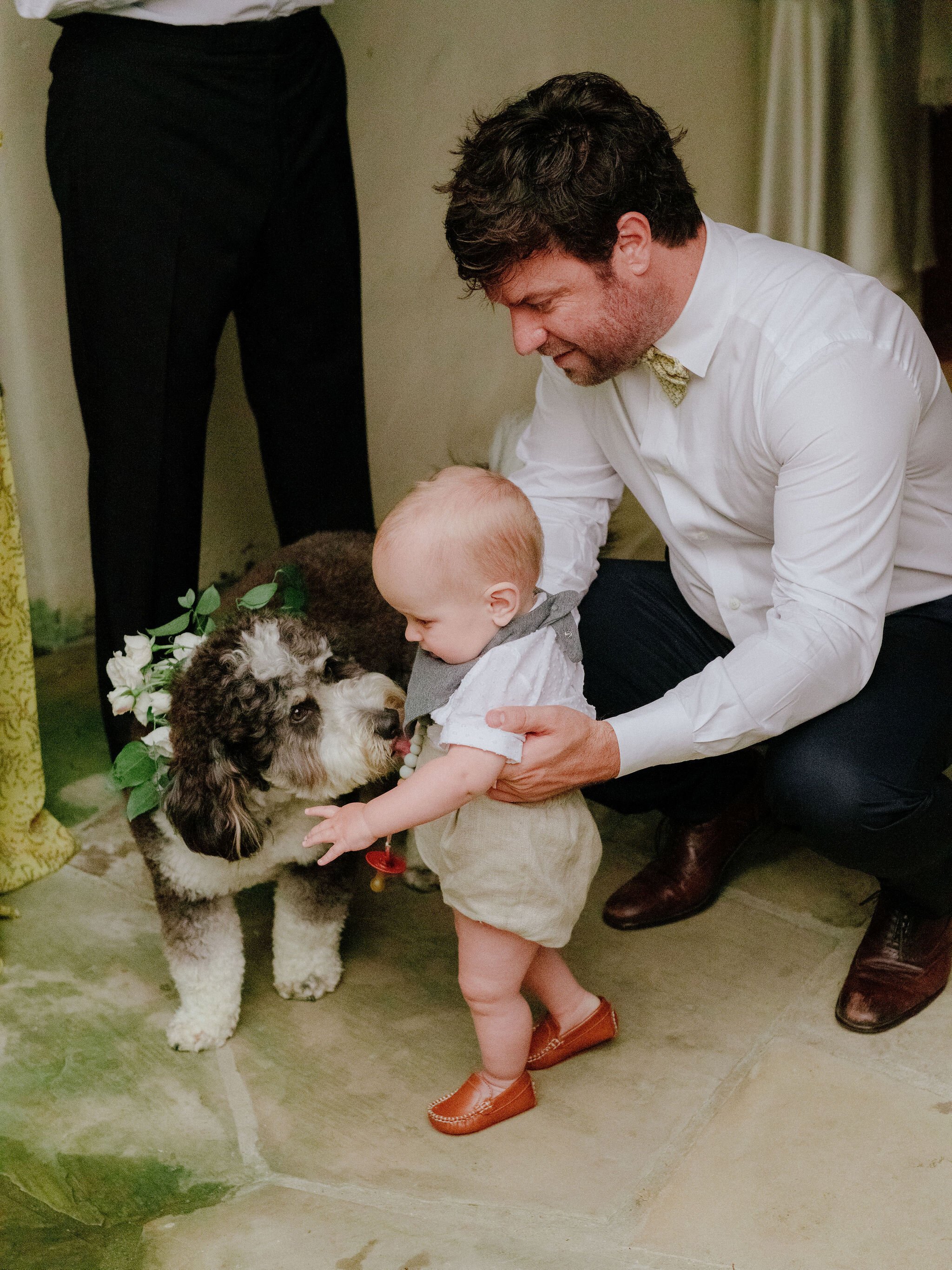 www.santabarbaraweddings.com | Chris J. Evans | Private Residence | Ashley Chanel Events | Rogue &amp; Fox | Groomsmen with Baby and Dog