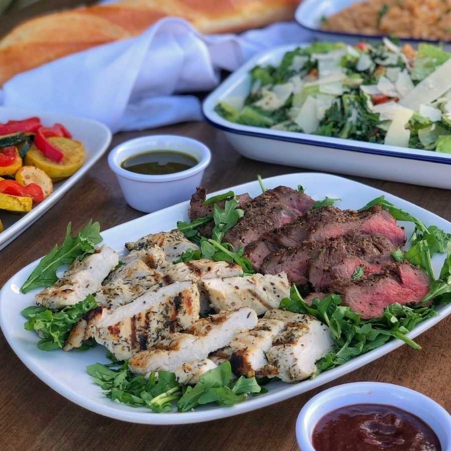 www.santabarbarawedding.com | Kyle’s Kitchen | Plated Chicken and Steak with a Side Salad
