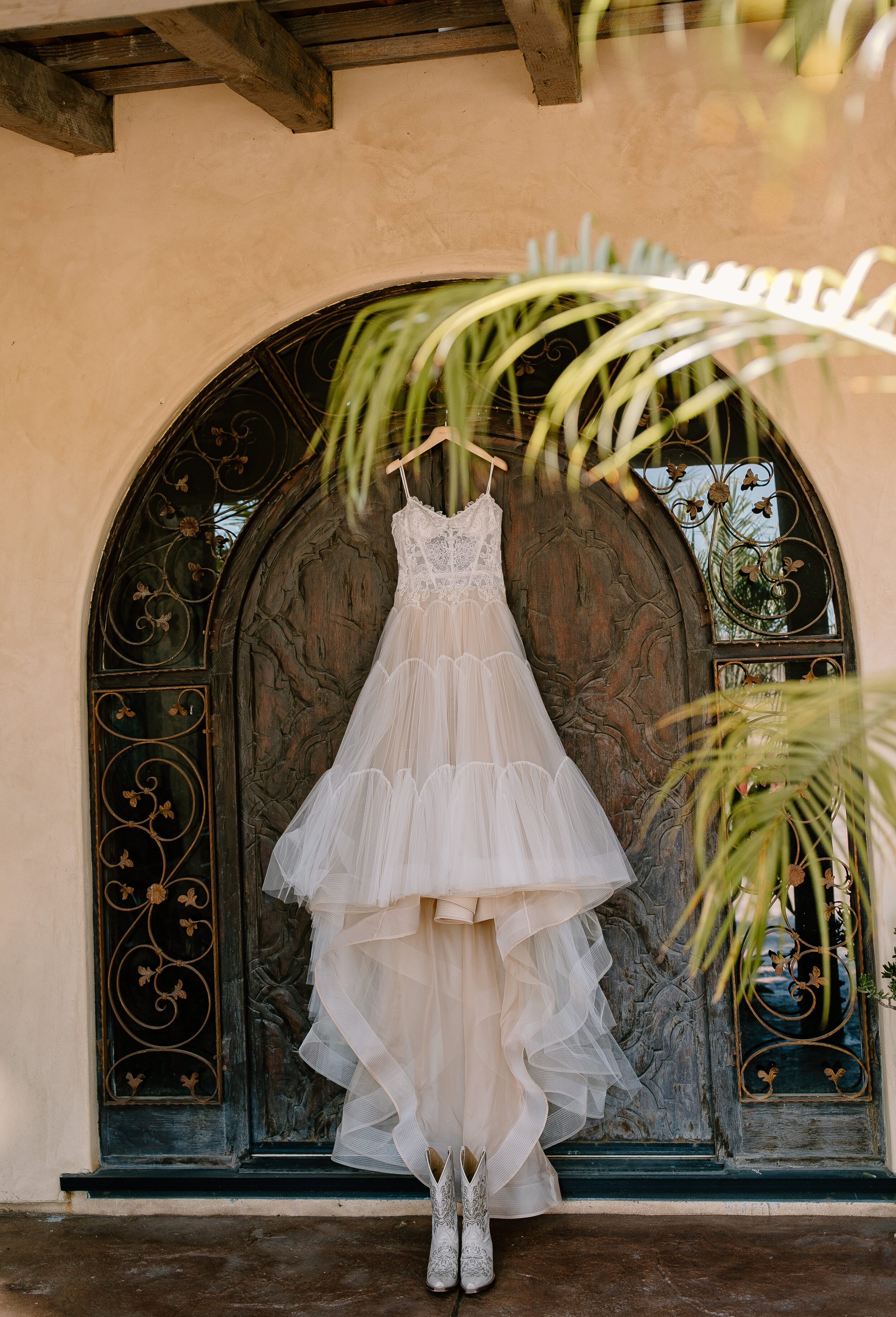 www.santabarbarawedding.com | Events by Fran | Becca Romero Creative | Bride’s Wedding Gown and Cowboy Boots