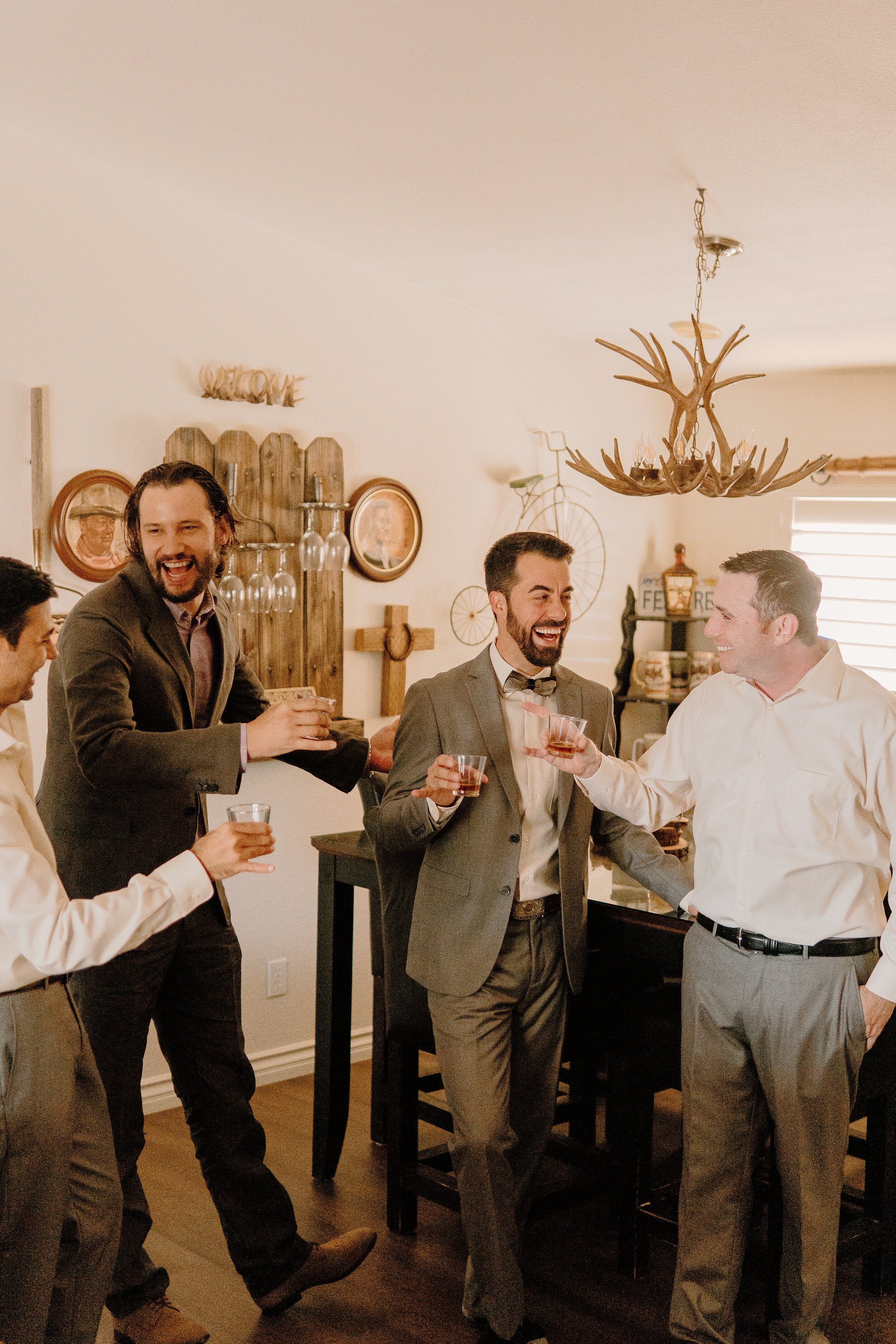 www.santabarbarawedding.com | Events by Fran | Becca Romero Creative | Unique Floral Designs | Groom Sharing a Drink with Groomsmen Before Ceremony 