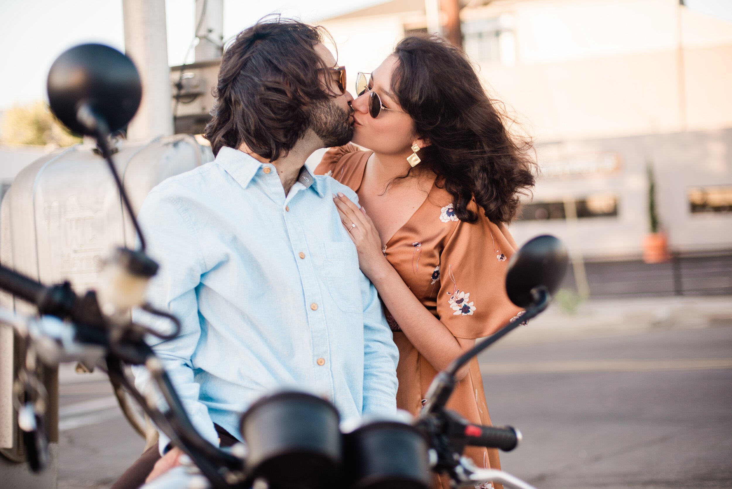 www.santabarbarawedding.com | ByCherry Photography | Funk Zone | Couple Downtown Kissing on a Motorcycle