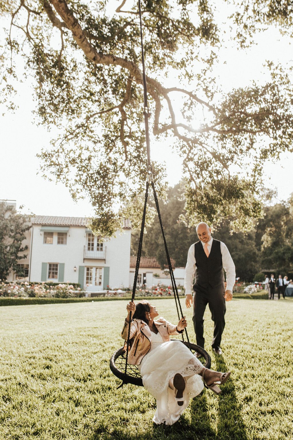 www.santabarbarawedding.com | The Indi Collective | Alpha Floral | Bride on the Swing in the Garden