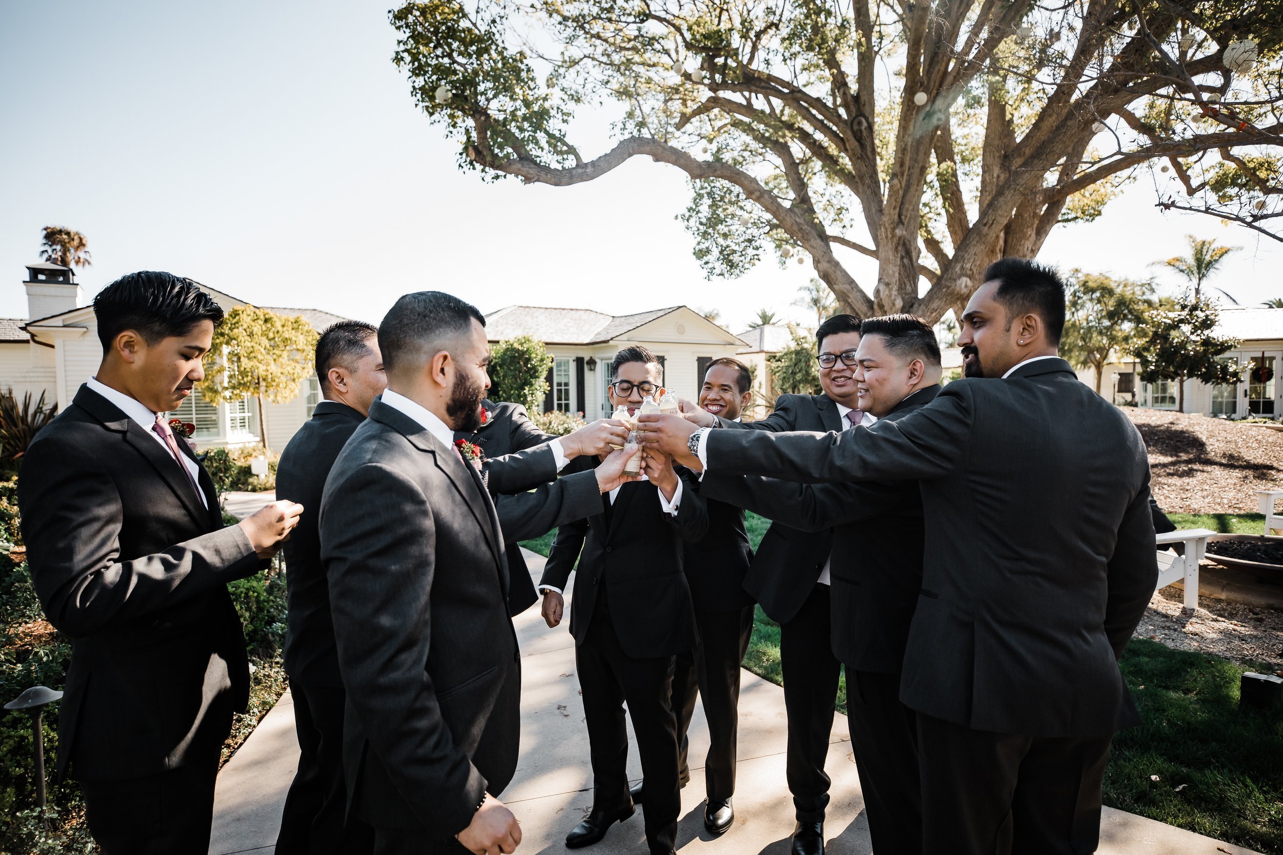 www.santabarbarawedding.com | Old Mission SB | Events by Maxi | Michelle Ramirez | Tangled Lotus | Groom Taking a Shot with His Groomsmen