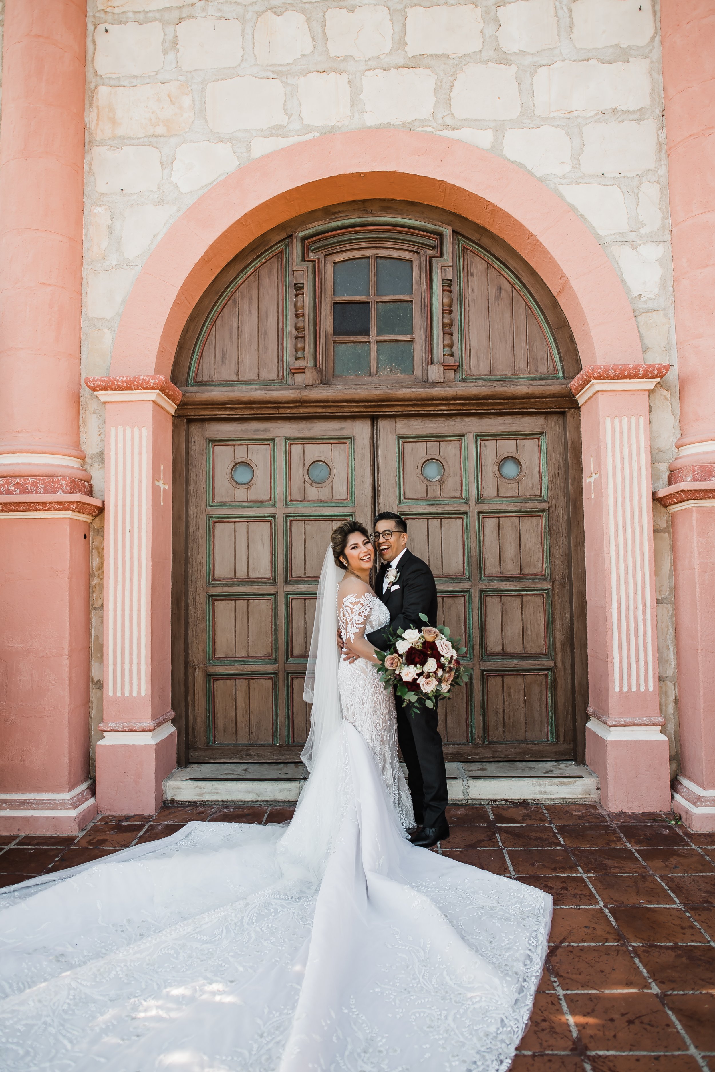 www.santabarbarawedding.com | Old Mission SB | Events by Maxi | Michelle Ramirez | Tangled Lotus | Bride and Groom in Front of the Church Doors