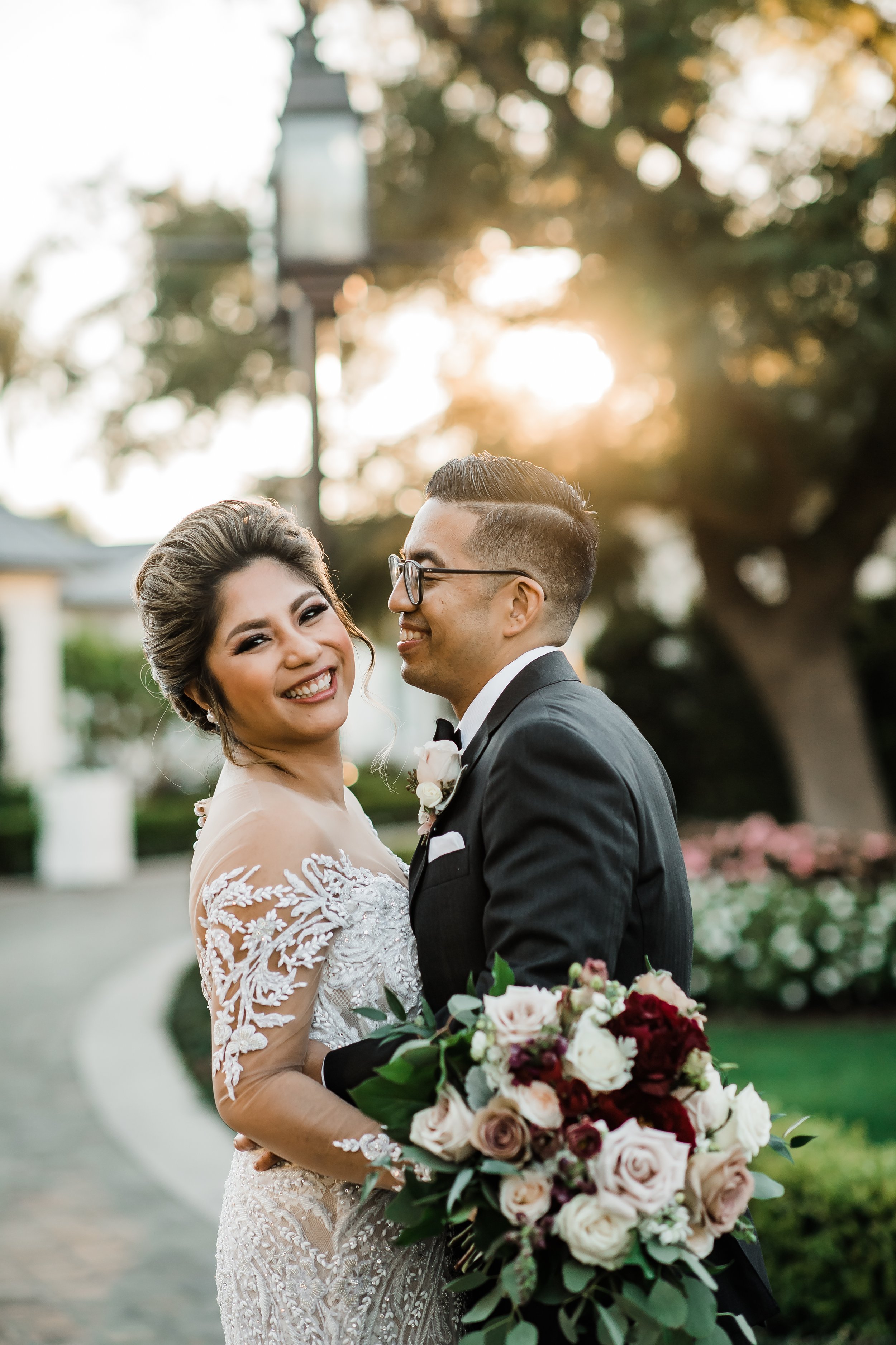 www.santabarbarawedding.com | Rosewood Miramar | Events by Maxi | Michelle Ramirez | Tangled Lotus | Bride and Groom Embrace Outside
