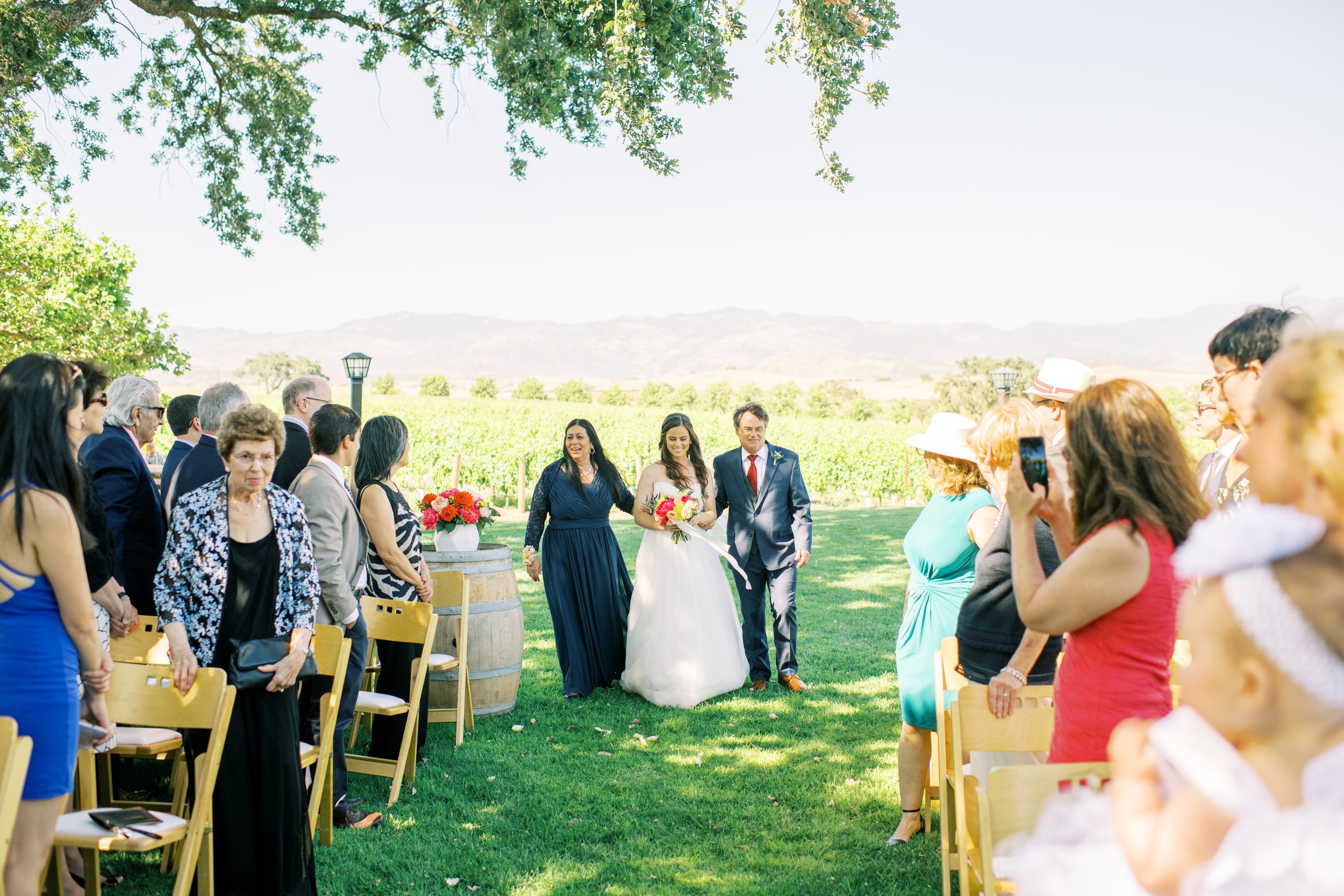www.santabarbarawedding.com | Loveridge Photography | Gainey Vineyard | Amber Alyse Events | Besame Floral | Bright Event Rentals | Lucky Devils Band | Bride Coming Down the Aisle