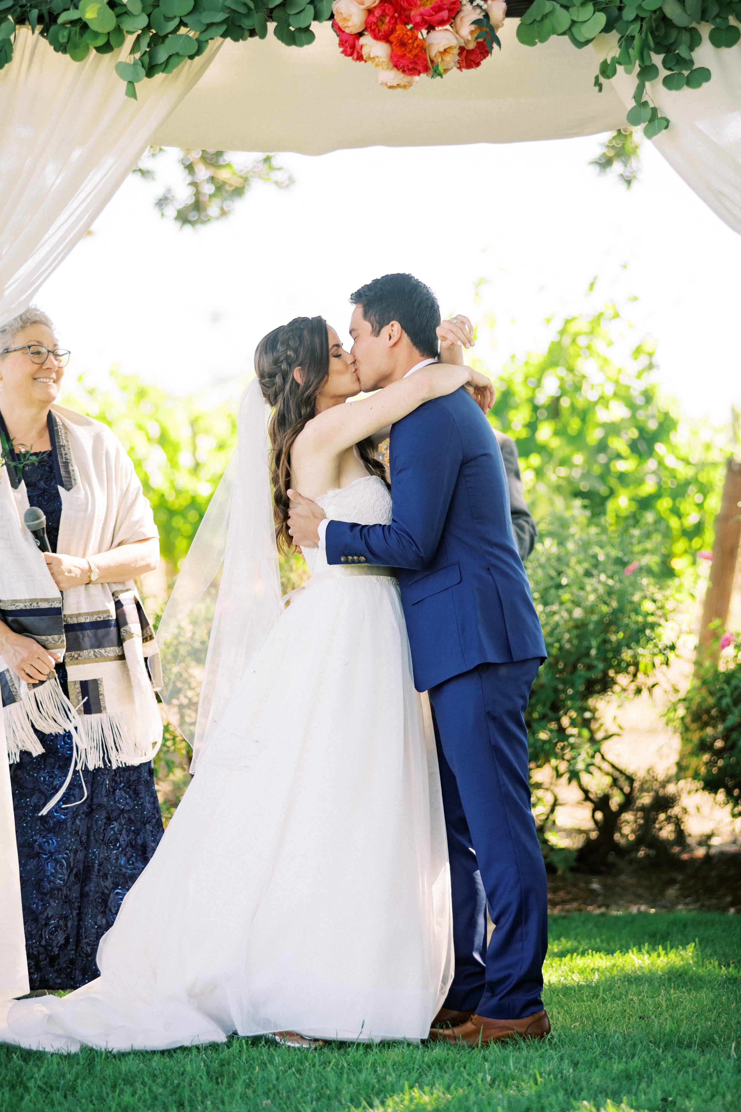 www.santabarbarawedding.com | Loveridge Photography | Gainey Vineyard | Amber Alyse Events | Rabbi Janice Mehring | Lucky Devils Band | Couple Shares Their First Kiss 