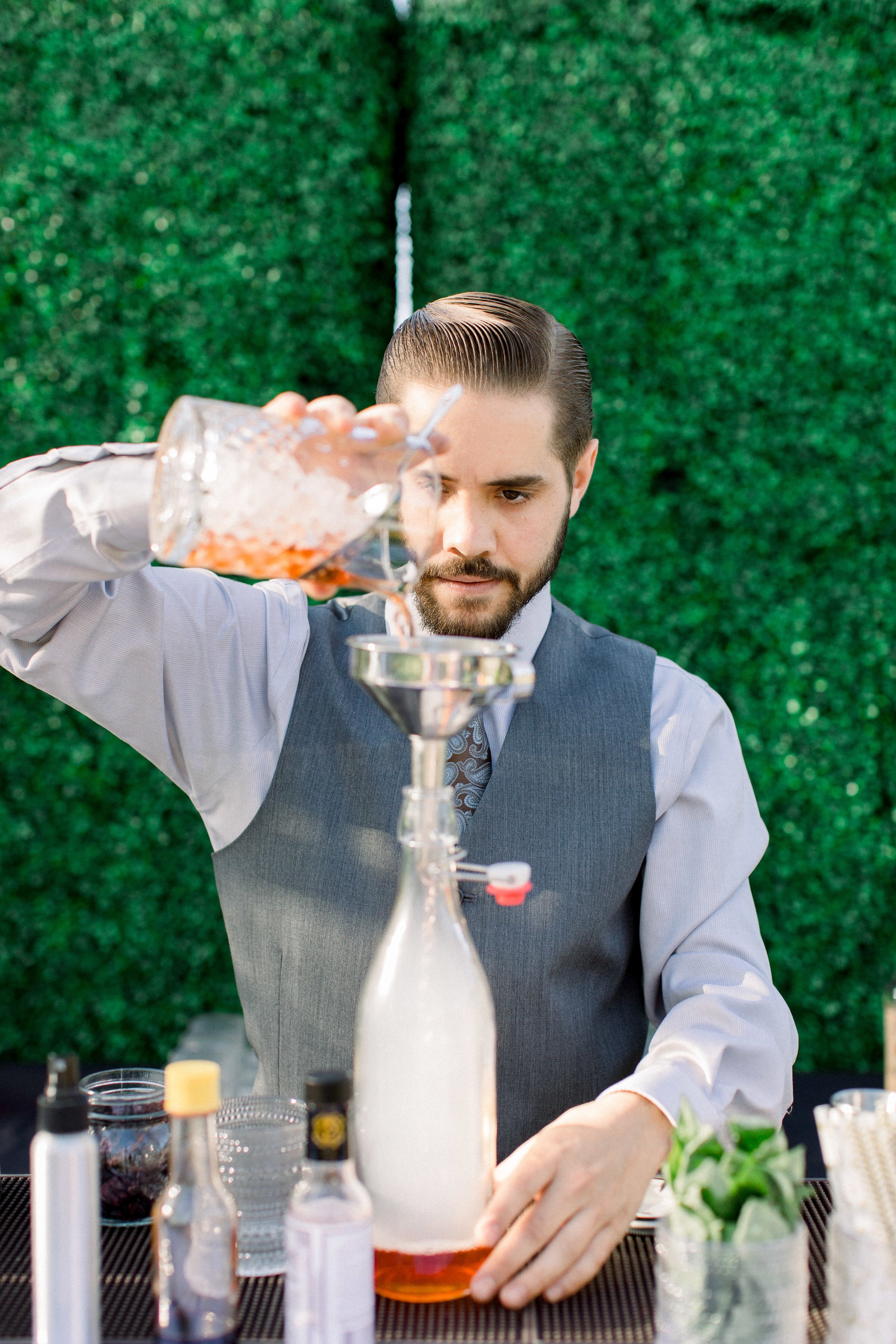 www.santabarbarawedding.com | Flair Project | Bartender Mixing Drinks