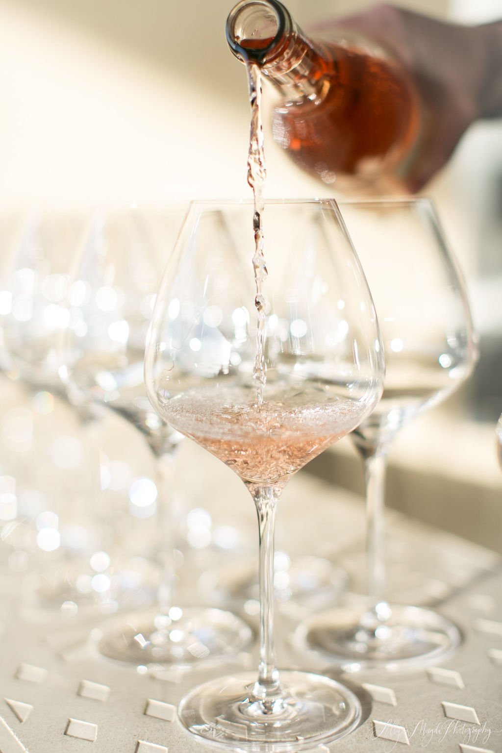 www.santabarbarawedding.com | Allyson Magda Photography | Presqu’ile Winery | Rosé Wine Poured Into Glasses